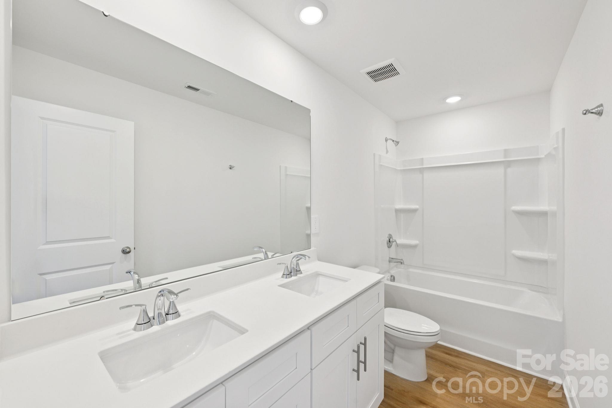 Photo is not of the actual home, but is an inspirational photo of builder’s model home and may depict options, furnishings, and/or decorator features that are not included - 1440 Wildflower Street, Newton