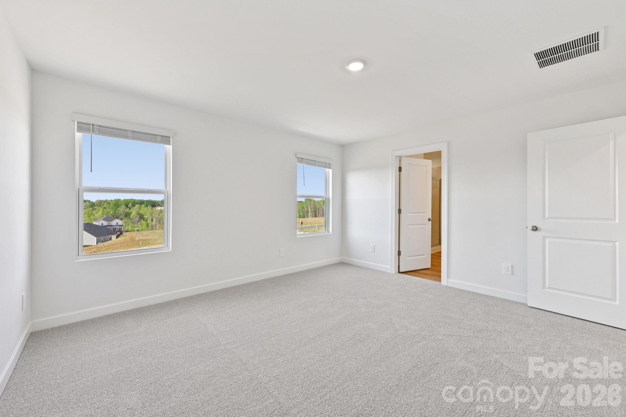 Photo is not of the actual home, but is an inspirational photo of builder’s model home and may depict options, furnishings, and/or decorator features that are not included - 1440 Wildflower Street, Newton