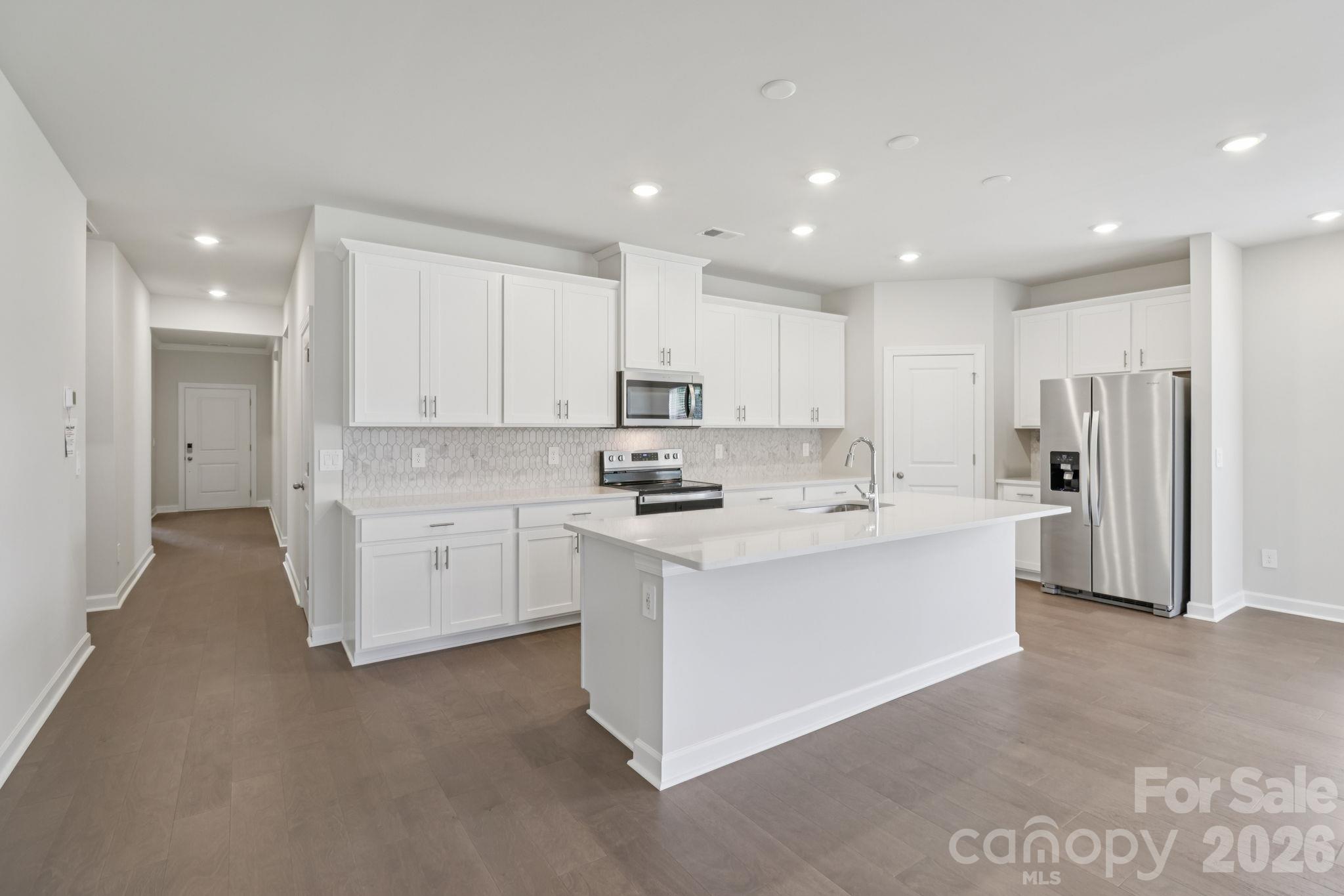 Photo is not of the actual home, but is an inspirational photo of builder’s model home and may depict options, furnishings, and/or decorator features that are not included - 2302 Snapdragon Court, Stanley