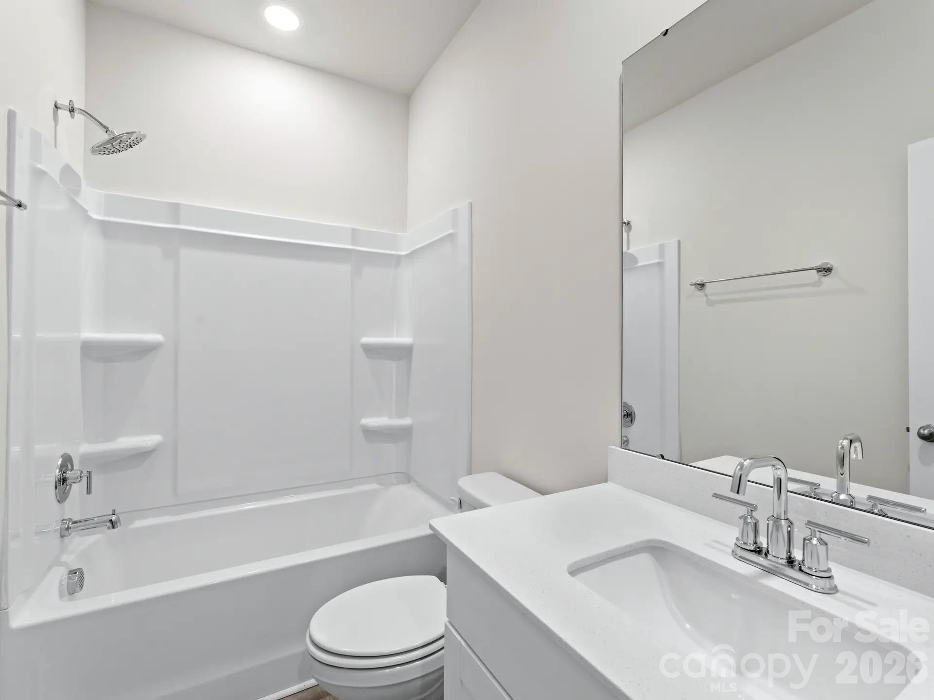Photo is not of the actual home, but is an inspirational photo of builder’s model home and may depict options, furnishings, and/or decorator features that are not included - 12523 Russellwood Lane, Charlotte
