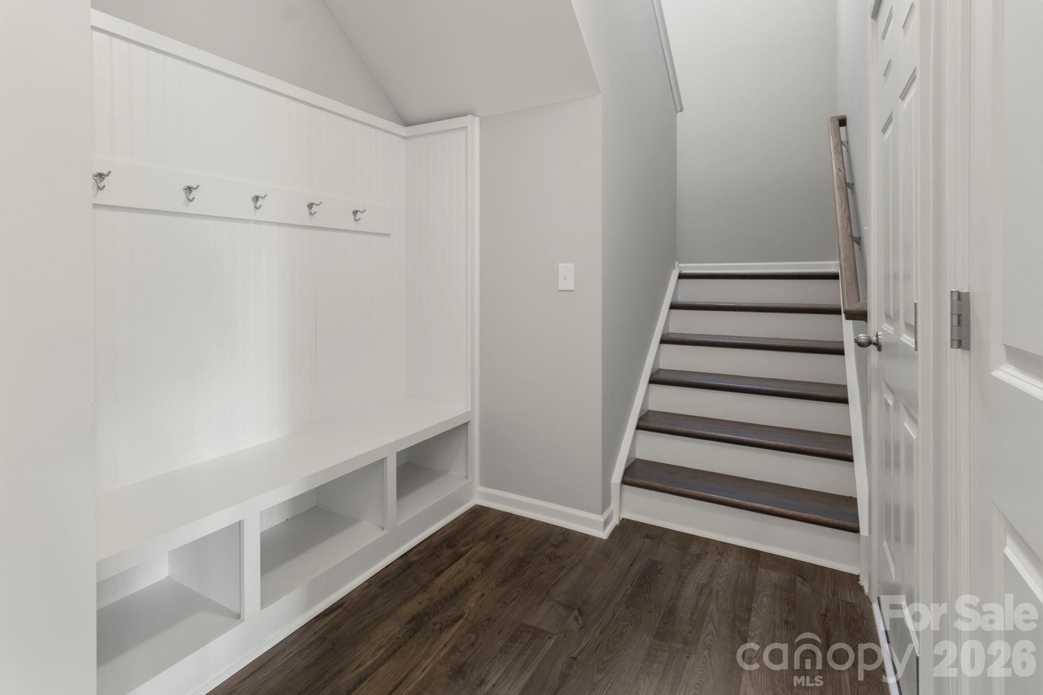 Built in bench with cubbies at foot of stairs - 1023 Freeman View Drive, Albemarle