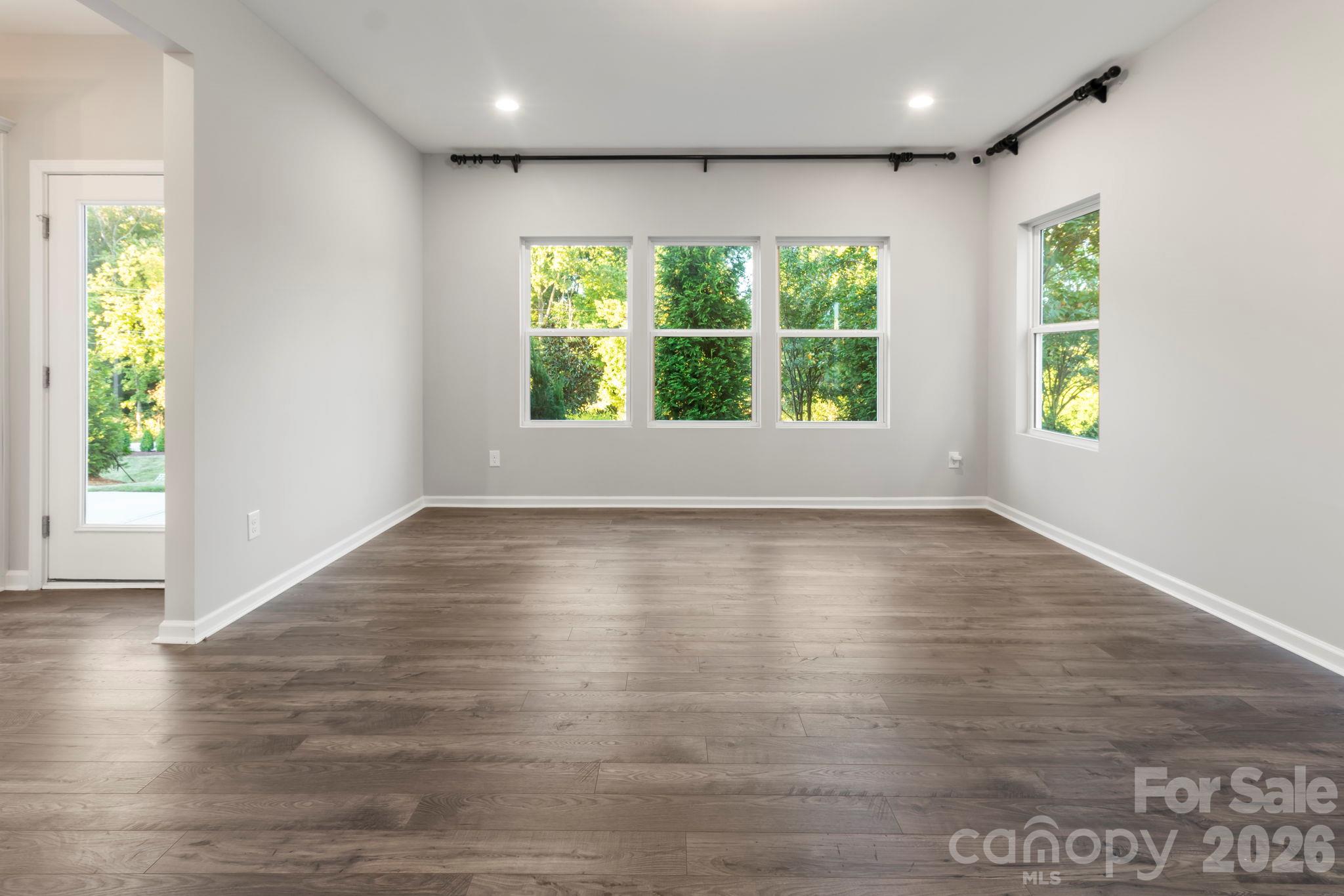 View of Great Room and back door leading out to the patio - 1023 Freeman View Drive, Albemarle