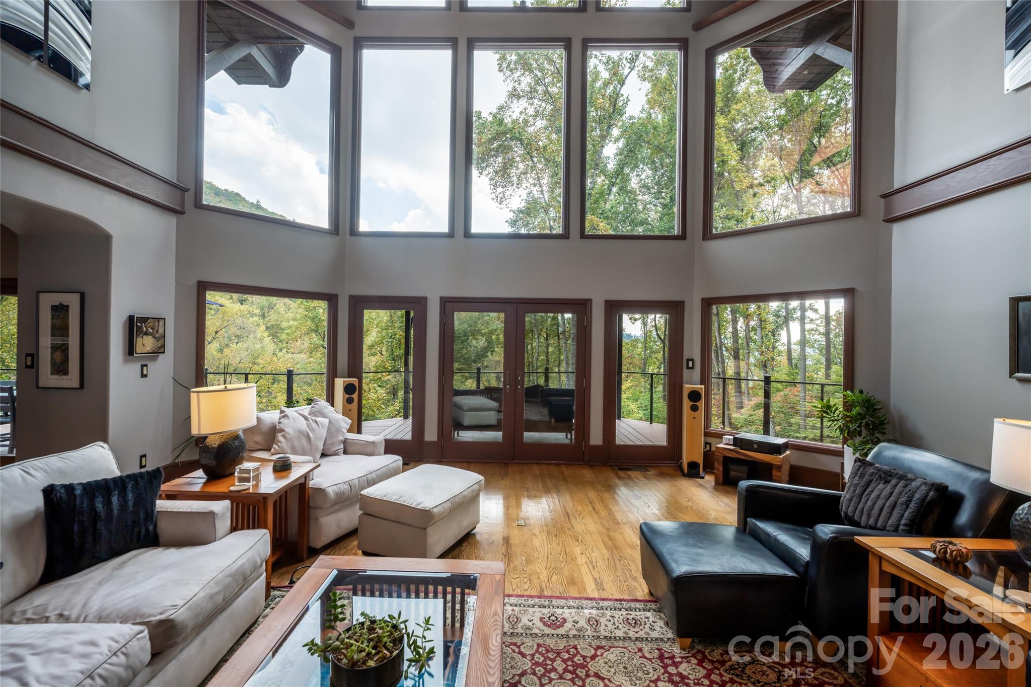 Walls of windows - 364 Lynn Cove Road, Asheville