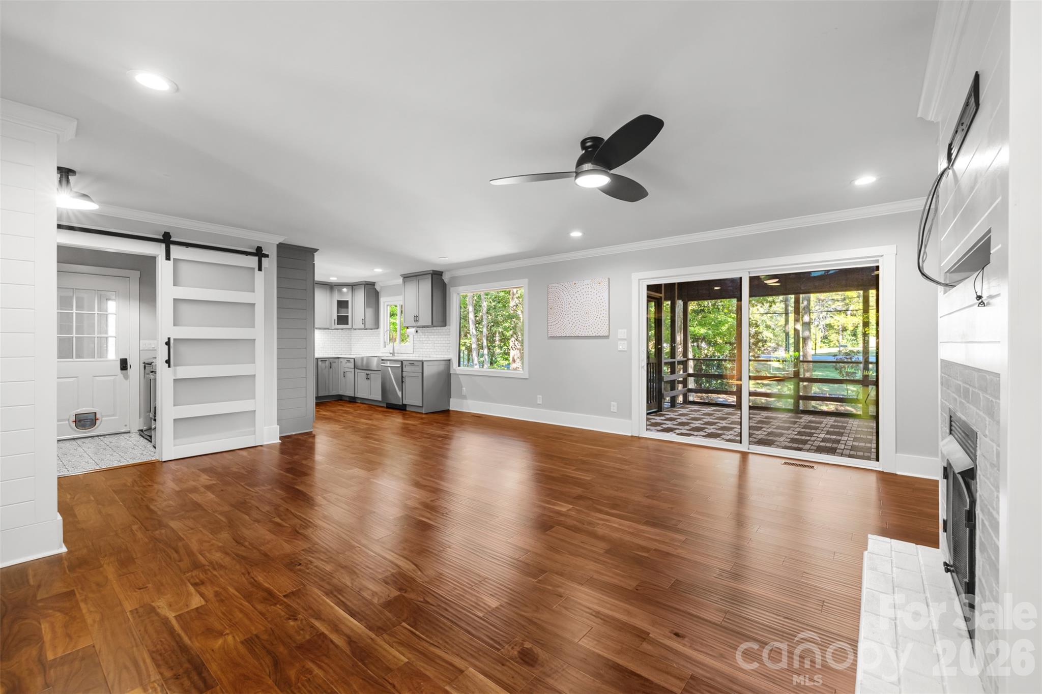 Living room, behind the sliding door is the laundry room - 6 Catawba Ridge Court, Clover