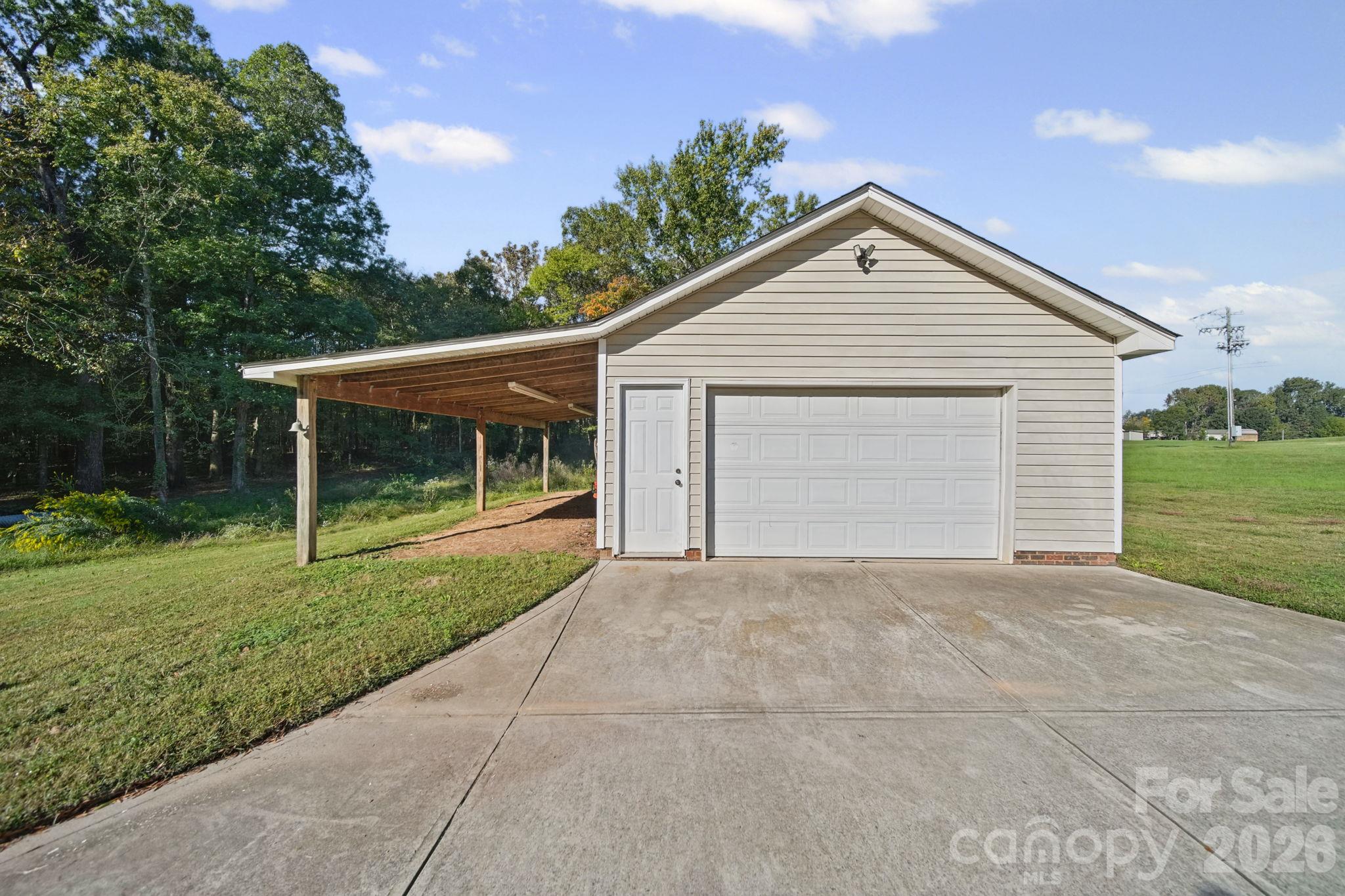 Single Family Residence at 4616 Olive Branch Road, Wingate, photo 31 of 35