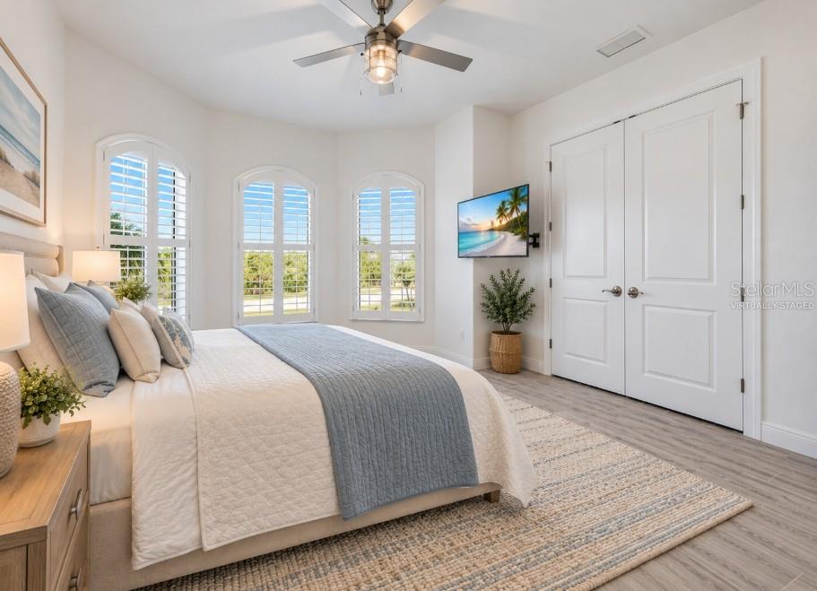 Virtually staged bedroom 2 - 8314 TRACY CIR, PORT CHARLOTTE