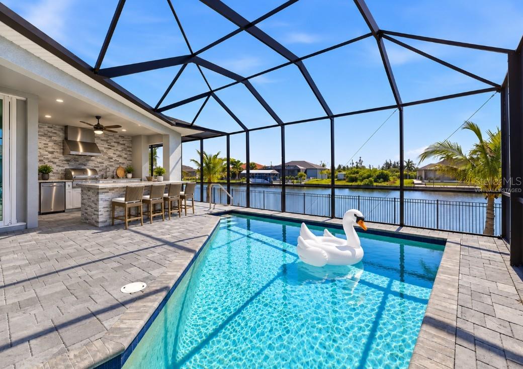 Virtually staged outdoor kitchen - 8314 TRACY CIR, PORT CHARLOTTE