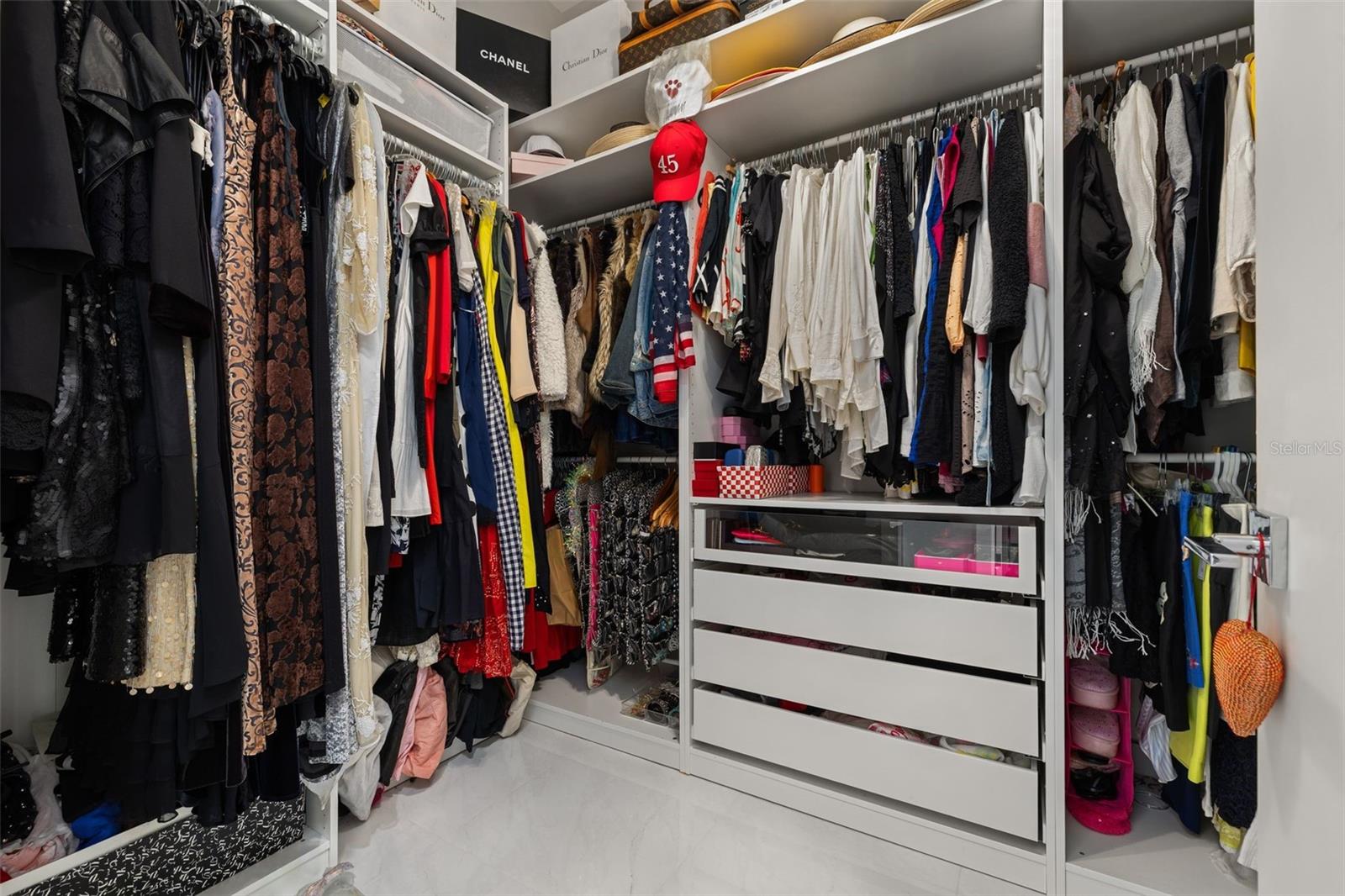 ...her custom fitted walk-in closets - 12620 S LAKE SAWYER LN, WINDERMERE