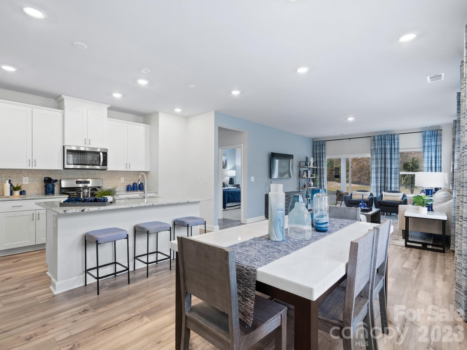 Photo is not of the actual home, but is an inspirational photo of builder’s model home and may depict options, furnishings, and/or decorator features that are not included - 12511 Russellwood Lane, Charlotte