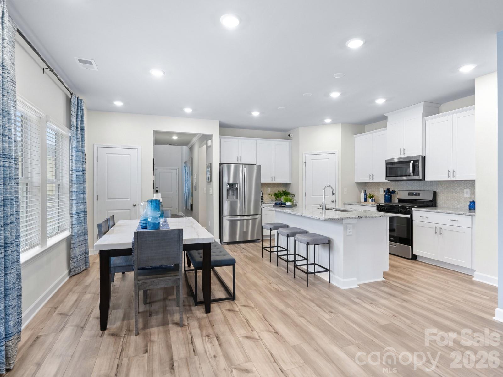 Photo is not of the actual home, but is an inspirational photo of builder’s model home and may depict options, furnishings, and/or decorator features that are not included - 12511 Russellwood Lane, Charlotte