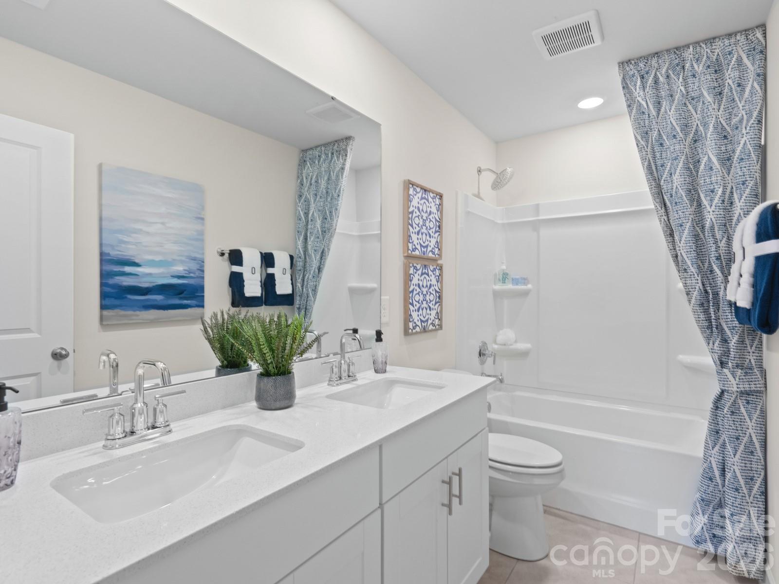 Photo is not of the actual home, but is an inspirational photo of builder’s model home and may depict options, furnishings, and/or decorator features that are not included - 12511 Russellwood Lane, Charlotte