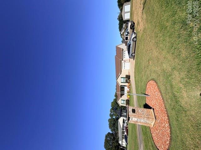 Front right of home. Detached garage in rear. - 643 Shoal Road, Lincolnton