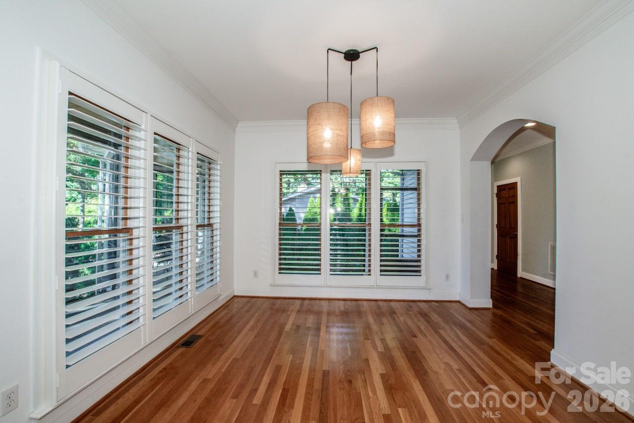 Lovely formal dining room with plantation shutters - 351 Catalina Drive, Mooresville