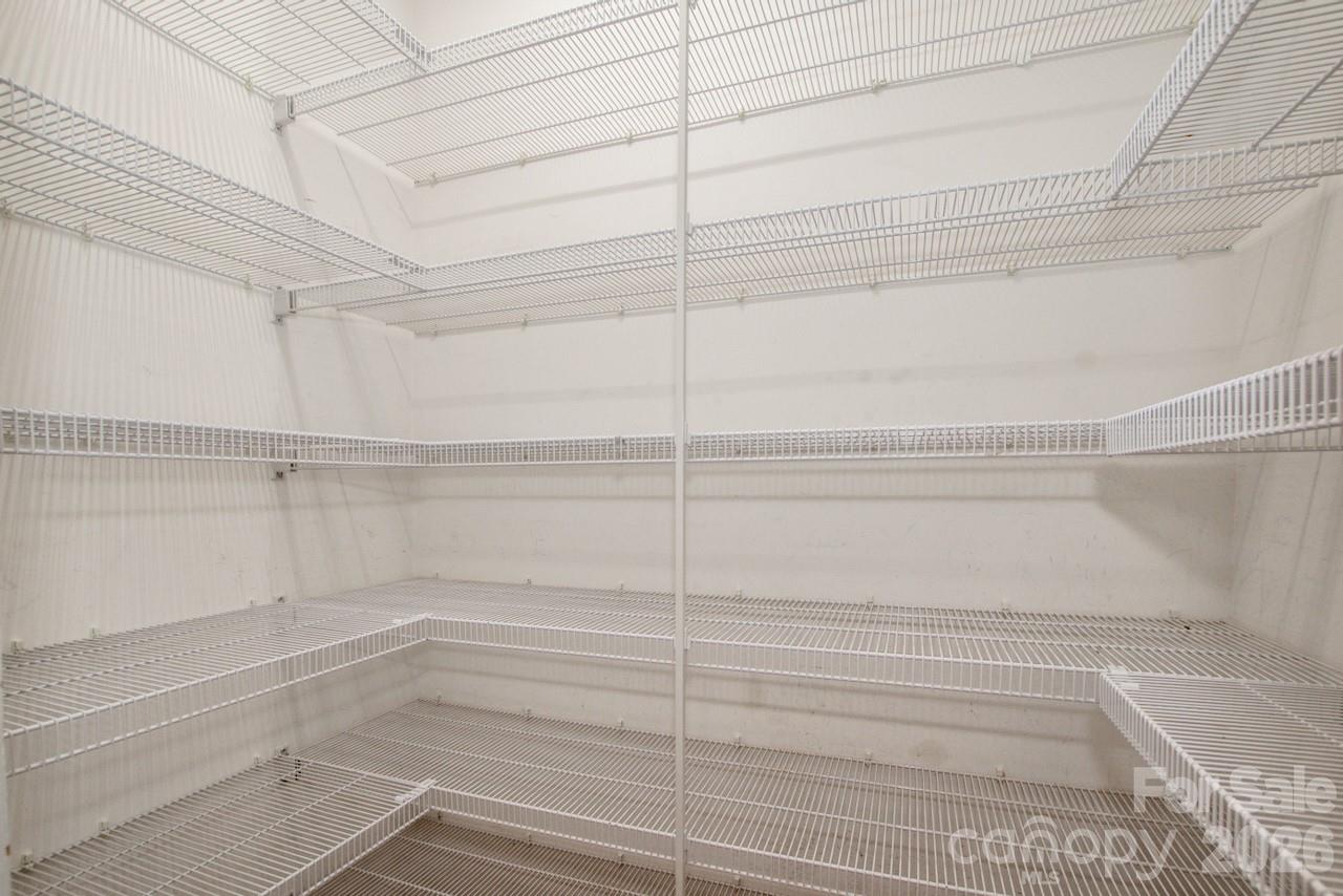Huge walk in pantry off kitchen hallway - 351 Catalina Drive, Mooresville