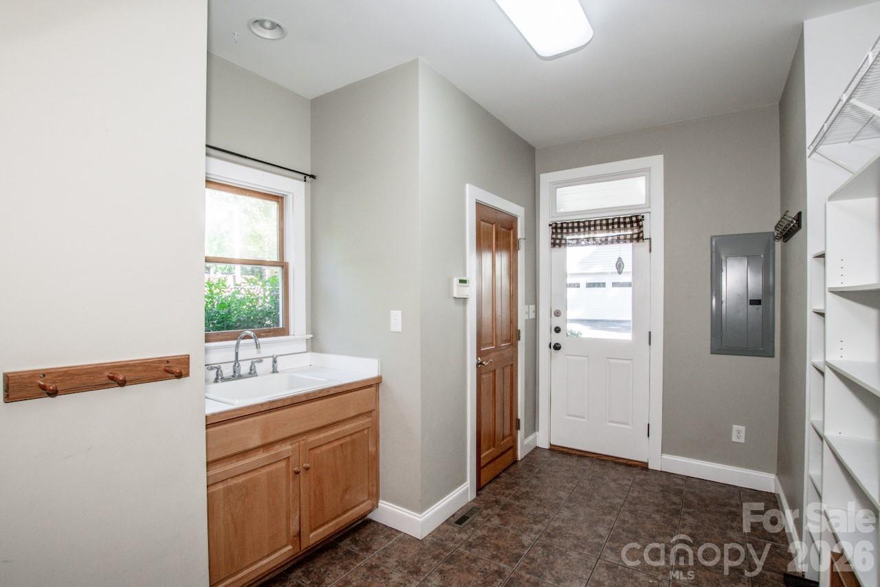 Mud/laundry room with sink and built in cabinets - 351 Catalina Drive, Mooresville