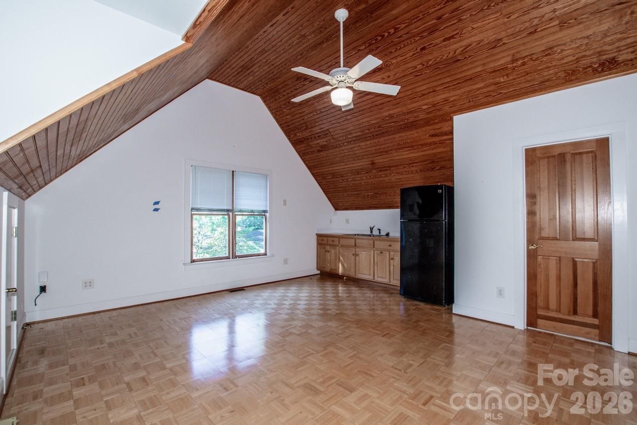 Vaulted ceiling and kitchenette in the great room of the 2nd LQtrs - 351 Catalina Drive, Mooresville