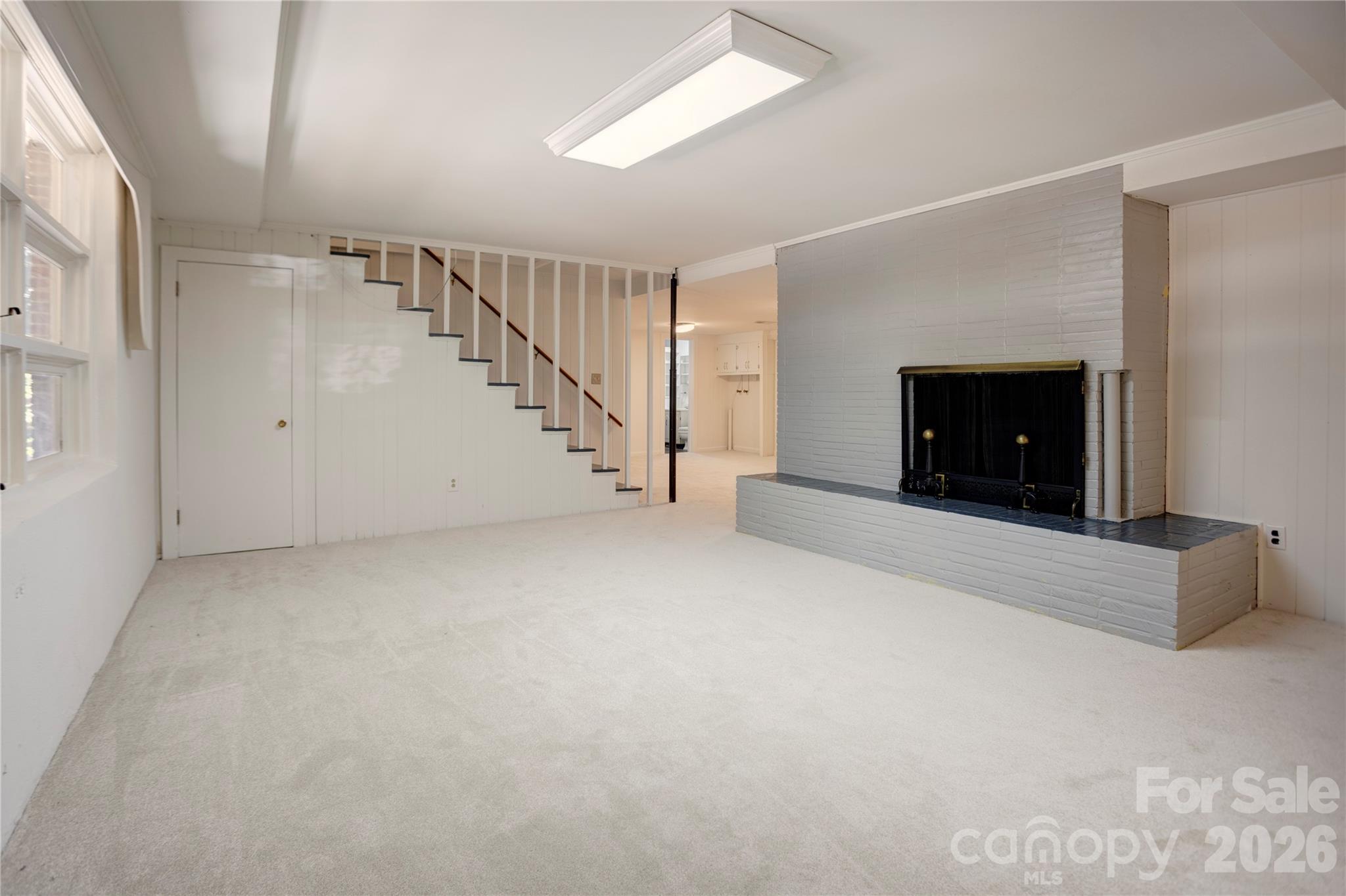 Family room (basement) - fireplace - 688 Grandview Drive NE, Concord