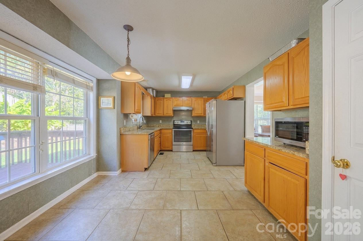 Digital Decluttering Applied - Photo edited to remove existing furniture/belongings - 89 N Wintergarden Road, Fletcher