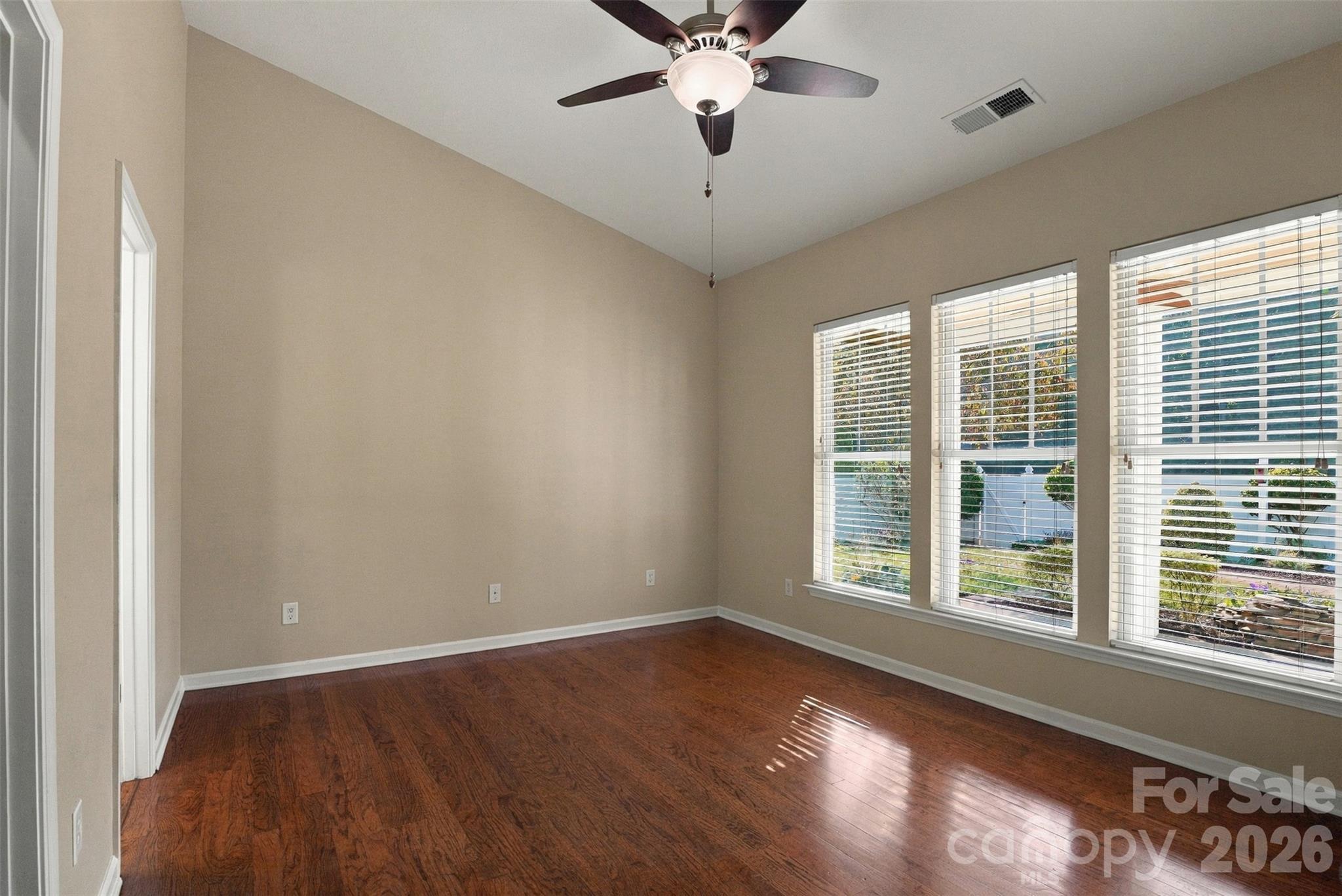 Primary bedroom with ensuite and walk-in closet! Don't miss the Vaulted ceiling and ceiling fan! - 608 Goldflower Drive, Rock Hill