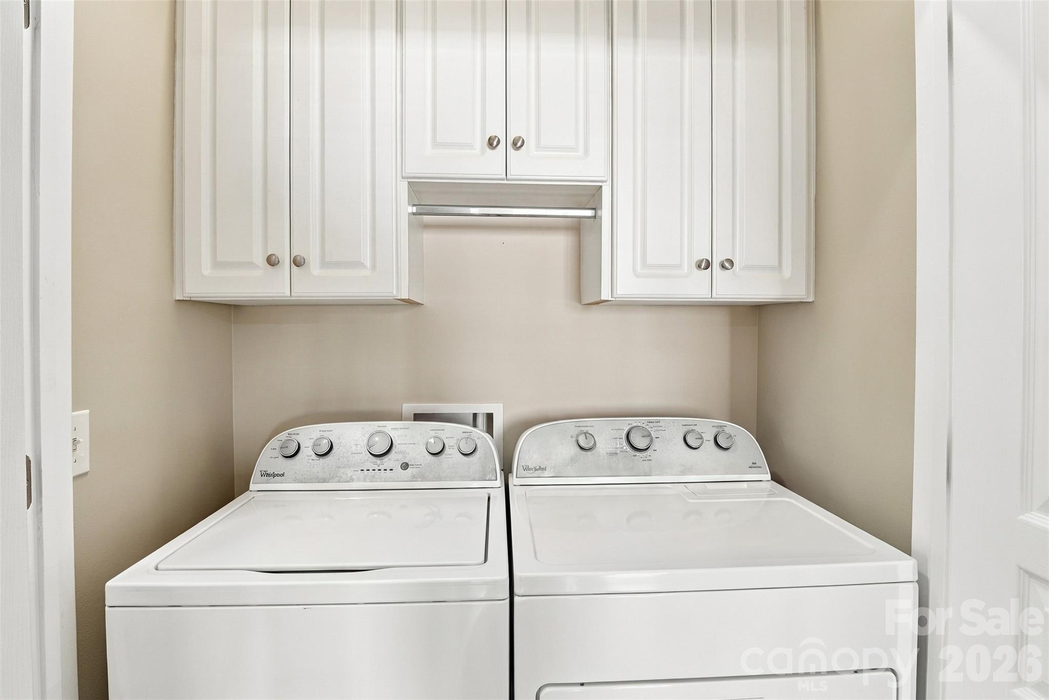 Laundry closet with extra storage and washer/dryer convey with home! - 608 Goldflower Drive, Rock Hill