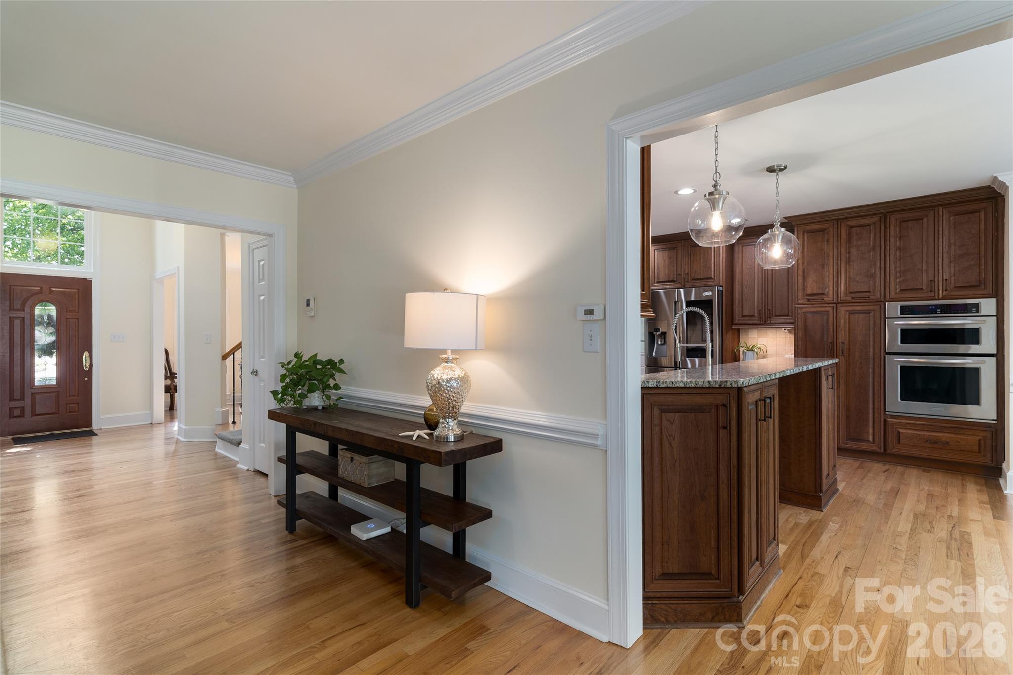 Entertain in the Chef's Kitchen with top of the line appliances and custom cabinetry - 16647 Greenfarm Road, Huntersville