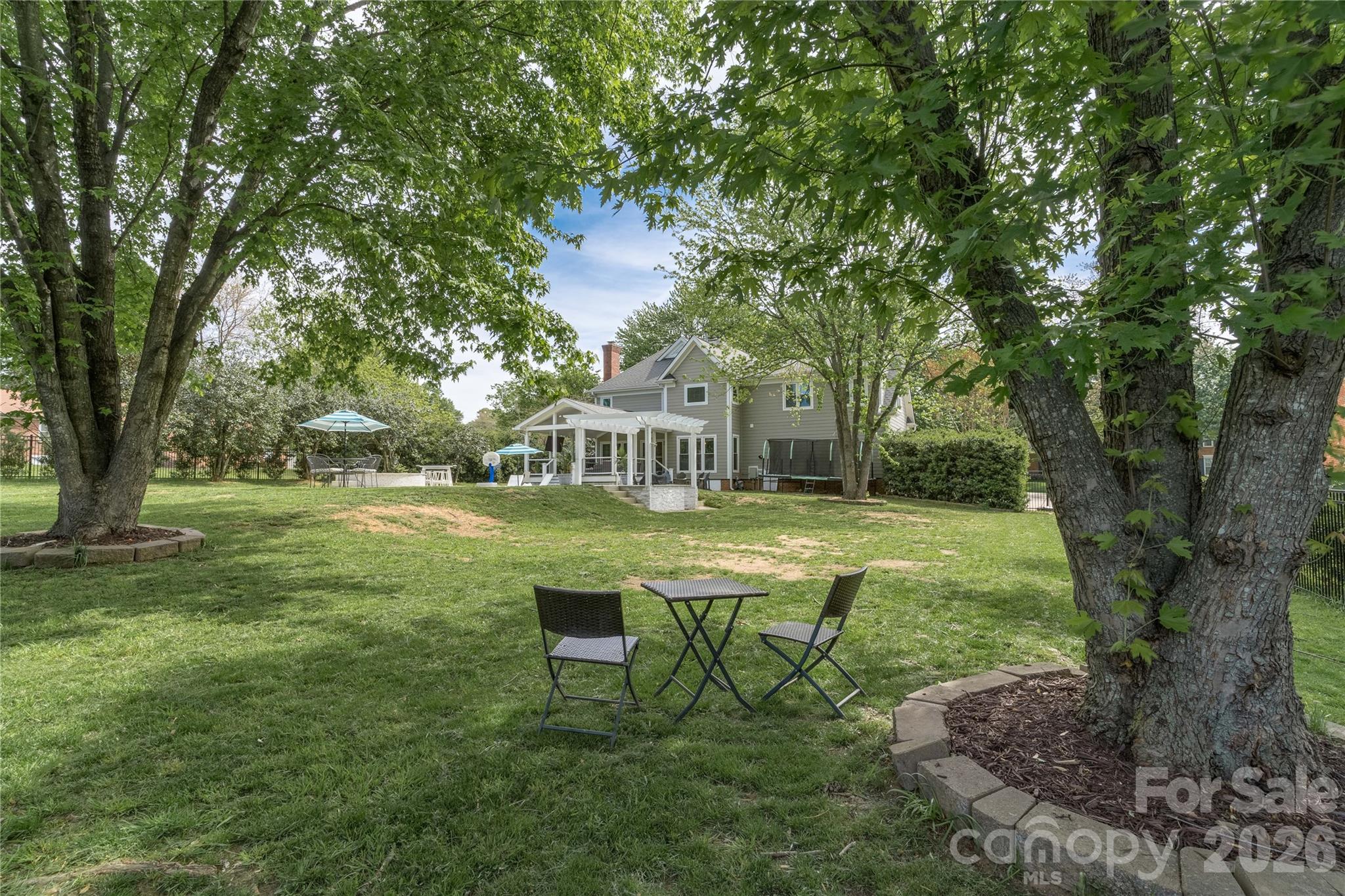 The backyard is massive and perfect for entertaining! - 16647 Greenfarm Road, Huntersville