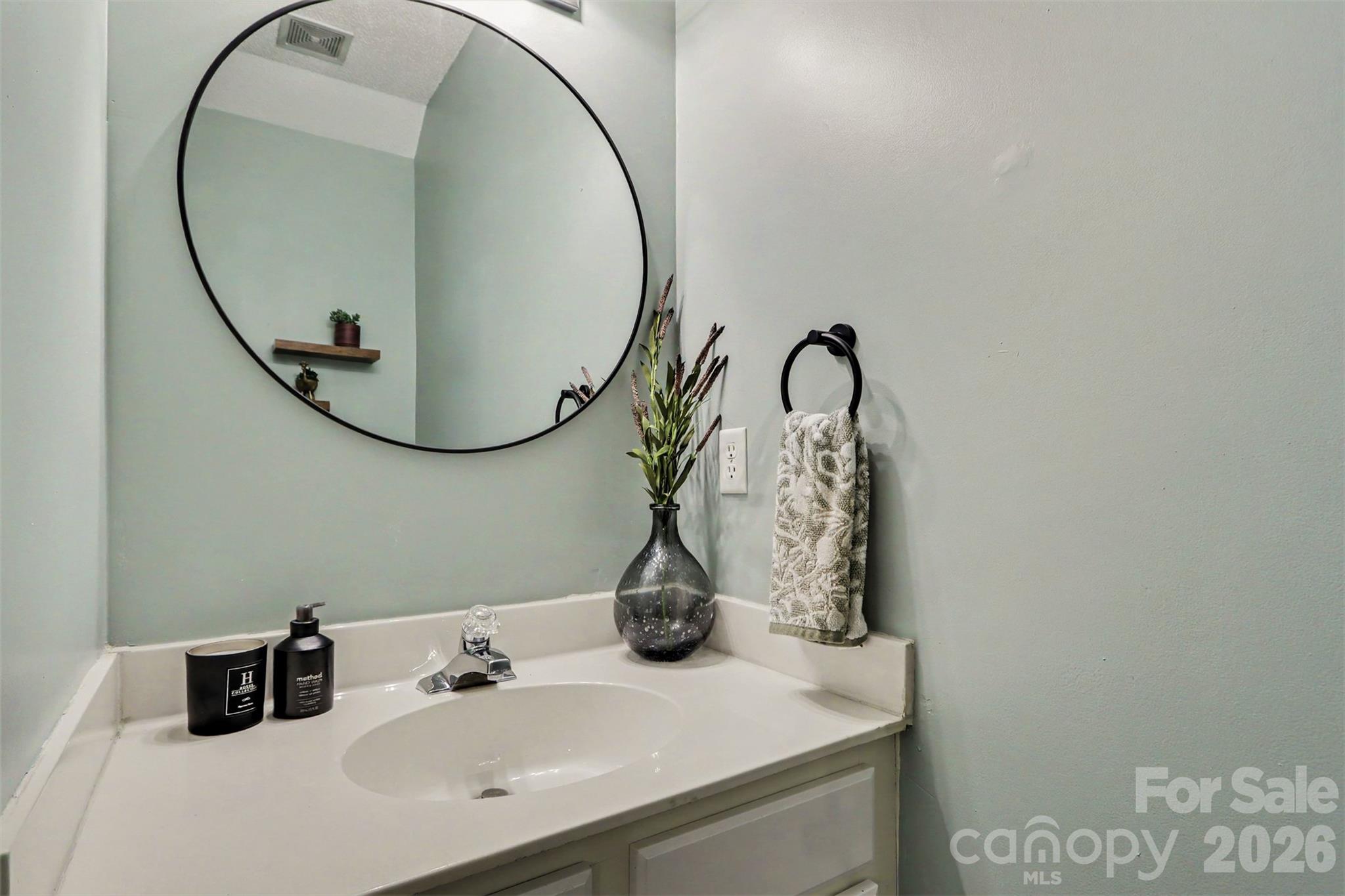Half bath on main level. - 9120 Treyburn Drive, Charlotte