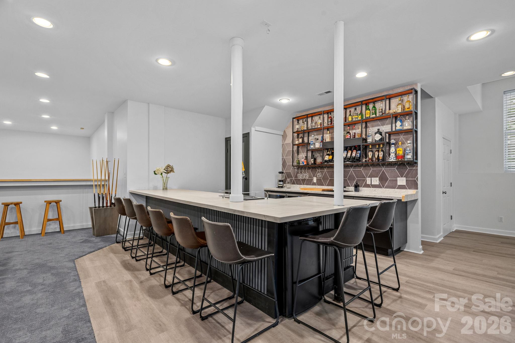 Great for entertaining, bar has a kegerator, wine fridge and lots of seating - 148 Sunrise Circle, Mooresville