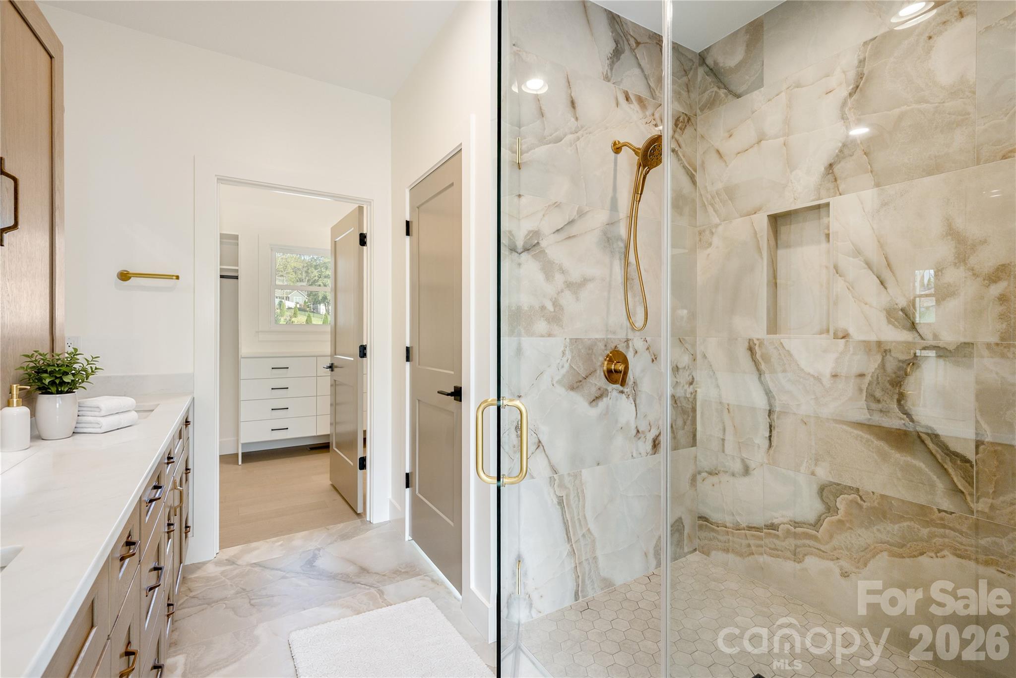 Primary en-suite custom shower with tile surround - 159 Meadow Breeze Road, Arden