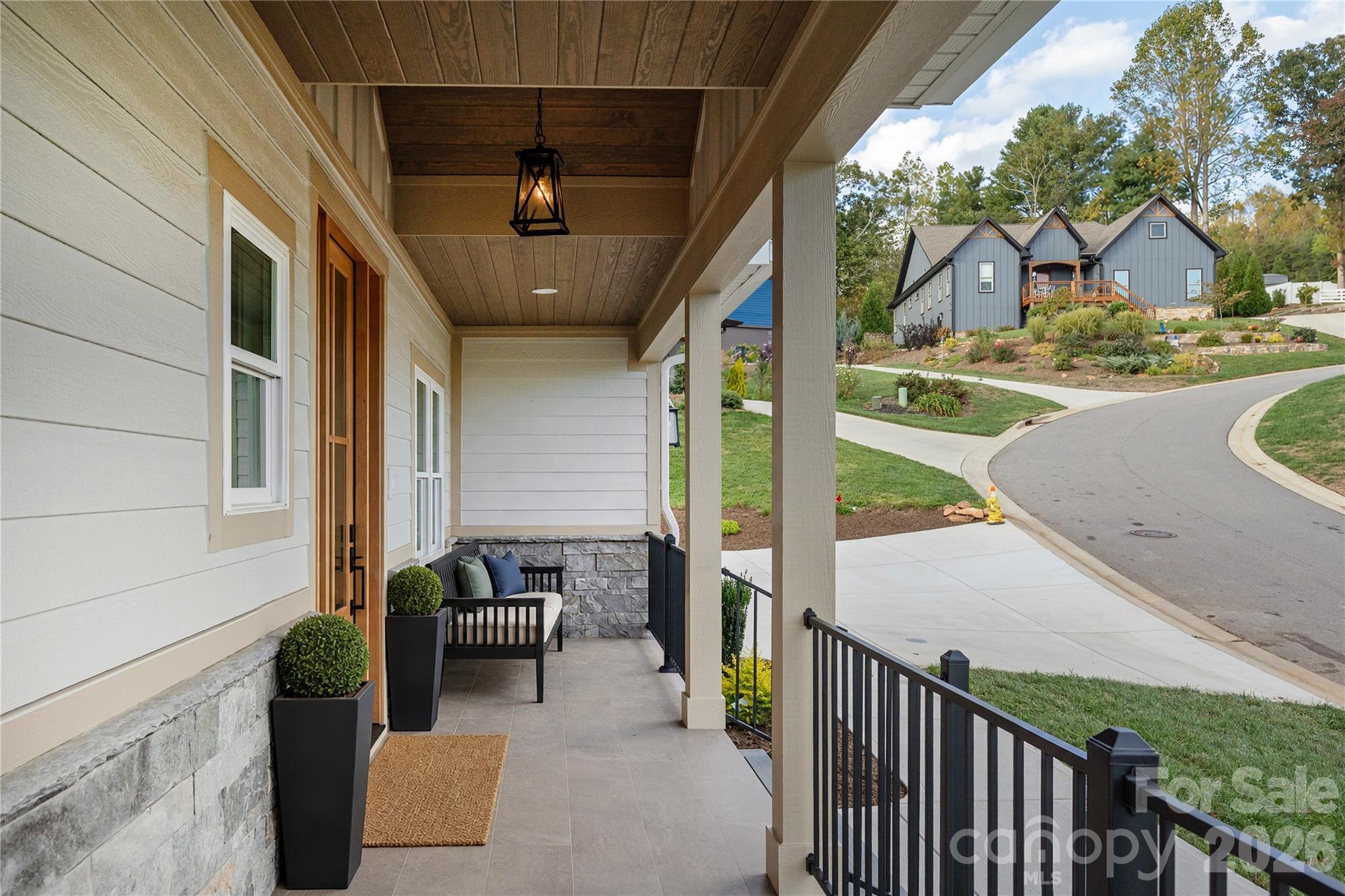 Front covered porch - 159 Meadow Breeze Road, Arden