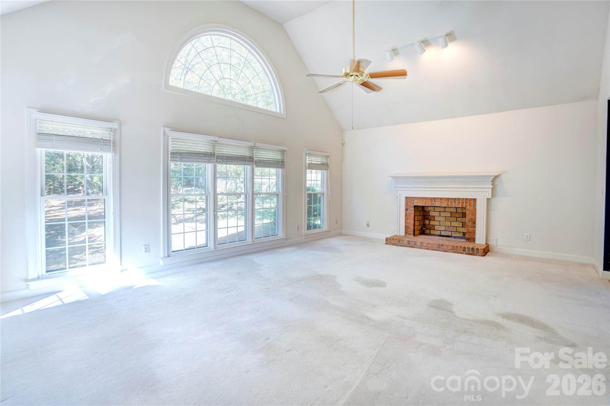 Large great room with soaring ceilings and fireplace - 890 Lyerly Ridge Road NW, Concord
