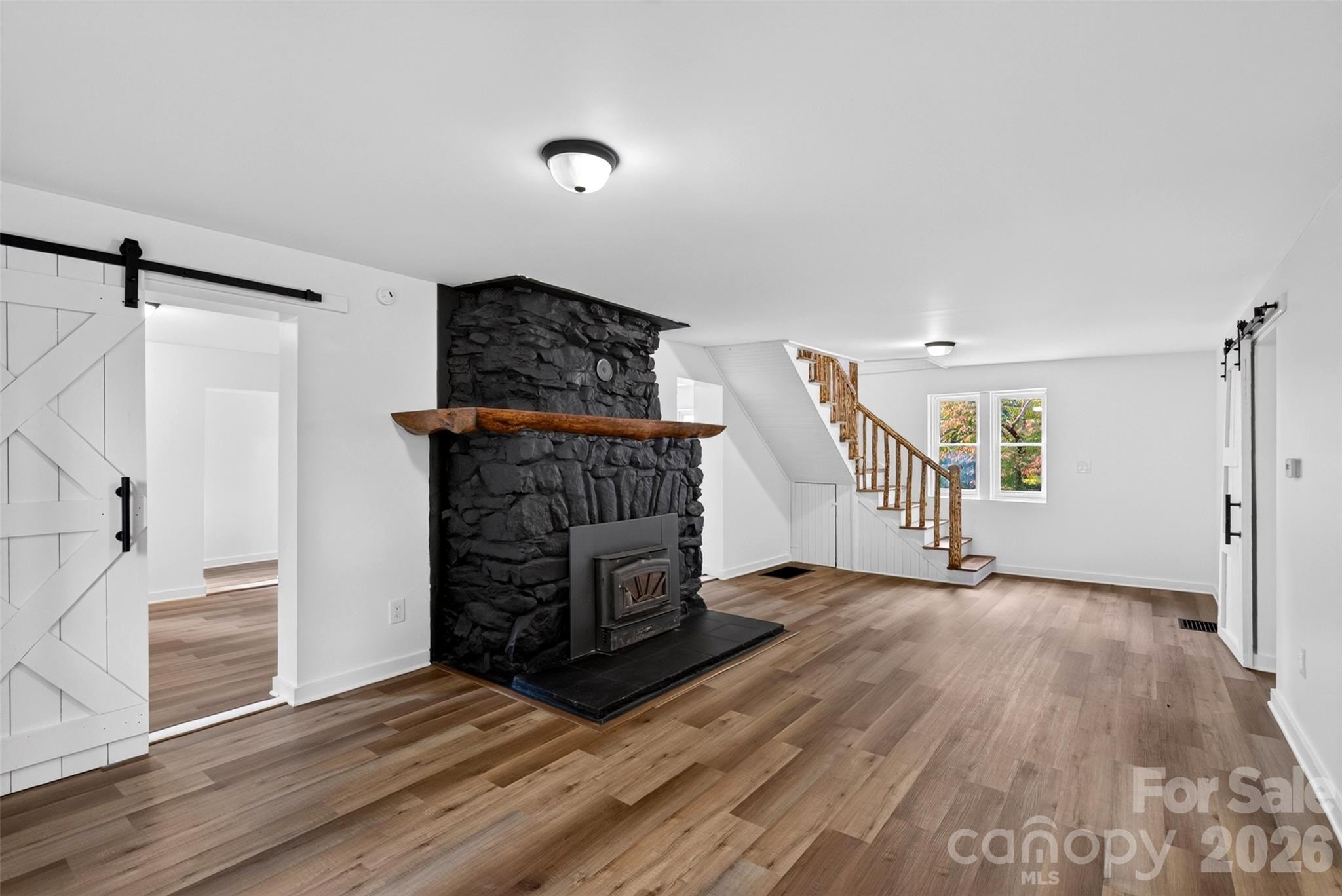 New LVP flooring downstairs - 64 Pine Cone Drive, Asheville