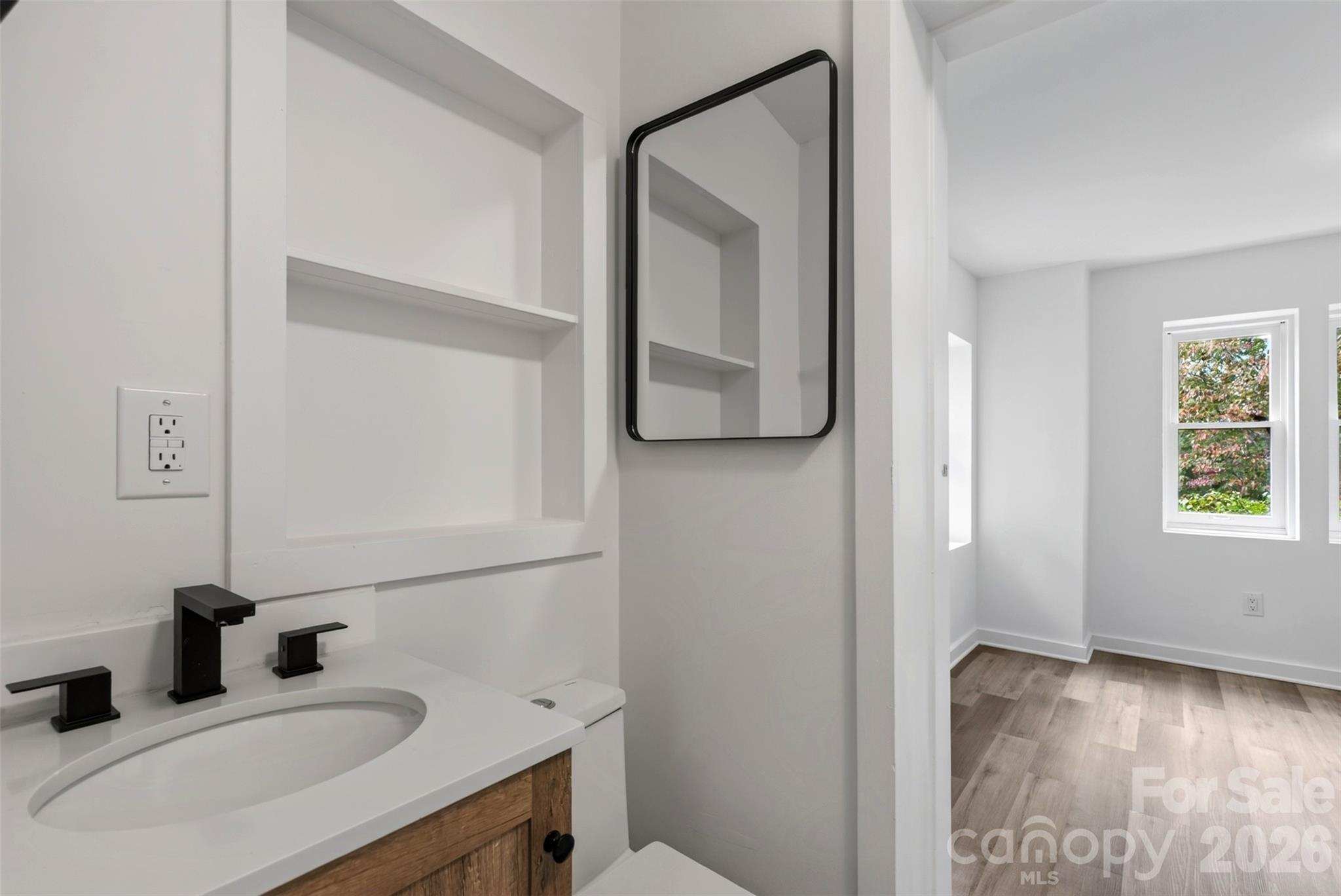 Updated main floor jack and jill bath. - 64 Pine Cone Drive, Asheville