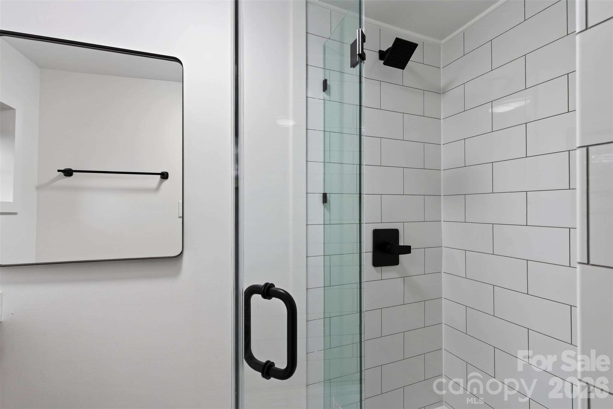 En-suite bath on main floor. - 64 Pine Cone Drive, Asheville