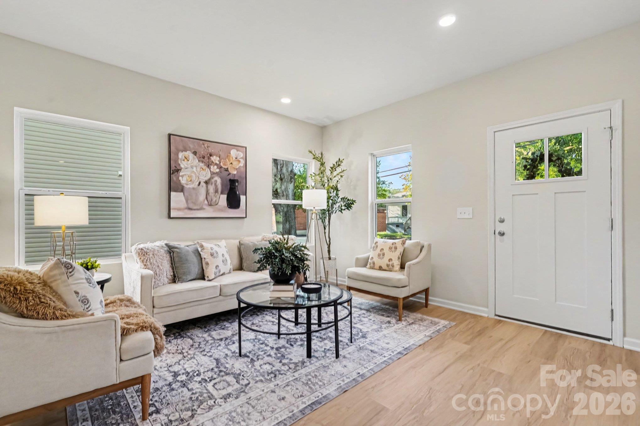 Great room has recessed lighting. - 121 Buffalo Avenue NW, Concord