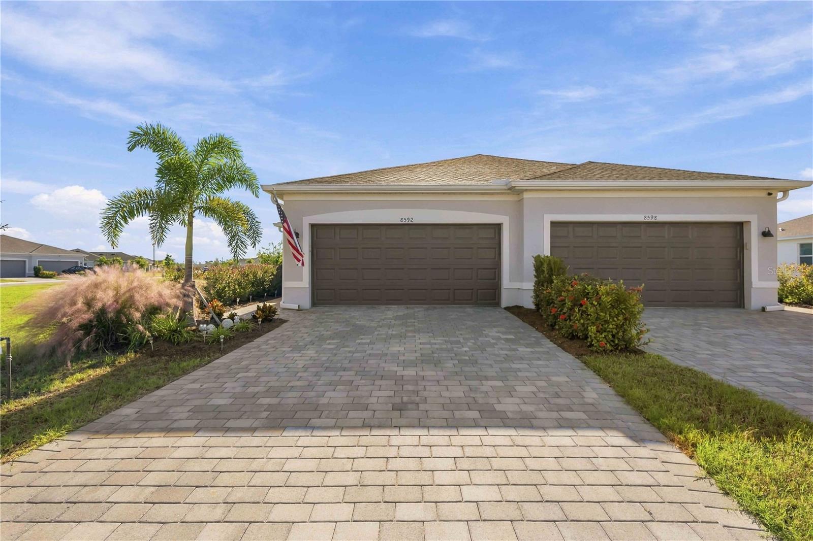 Pavered driveway and lanai - 8592 SEASALT LOOP, ENGLEWOOD