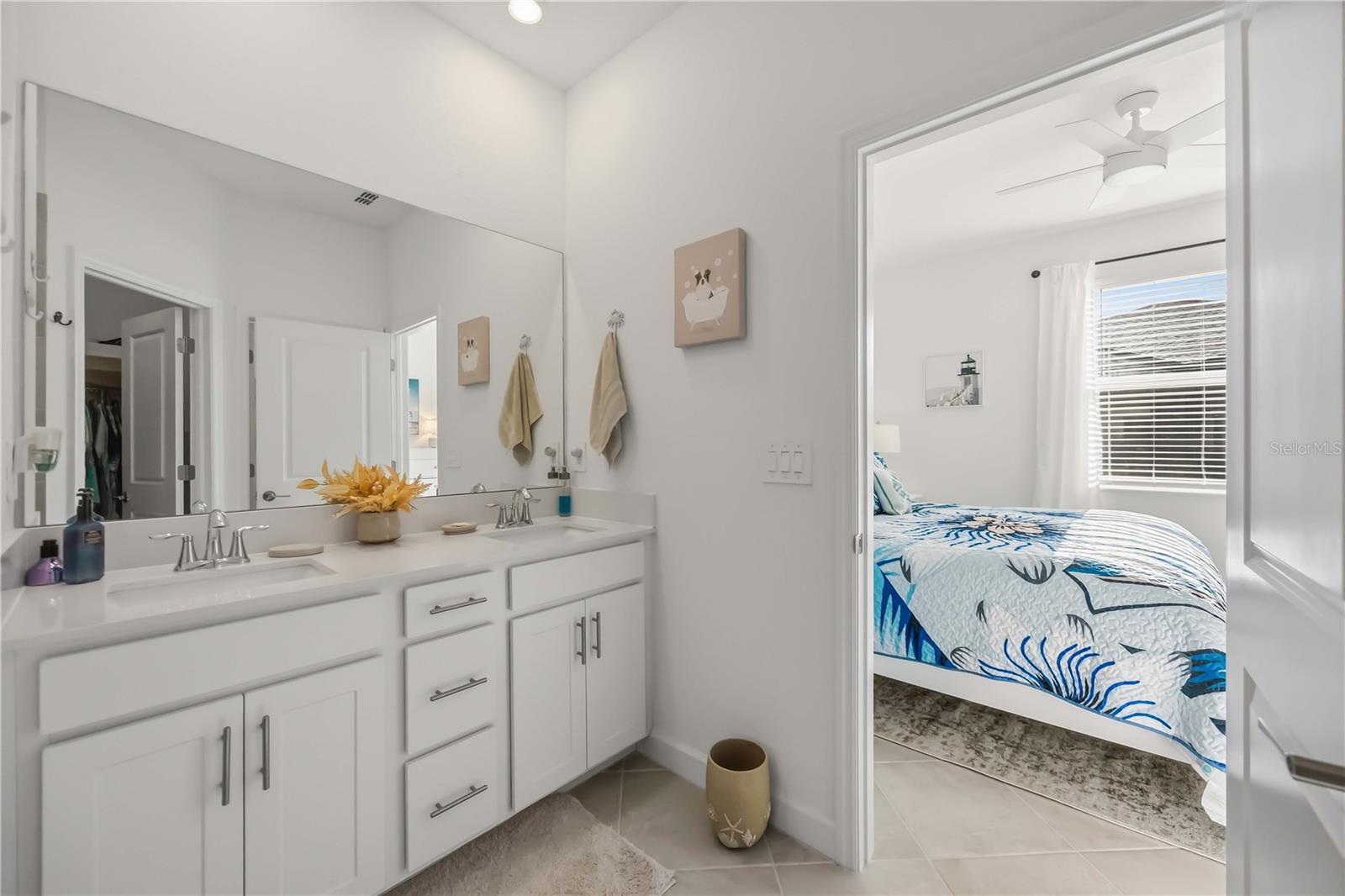Owner's bathroom with dual vanities - 8592 SEASALT LOOP, ENGLEWOOD