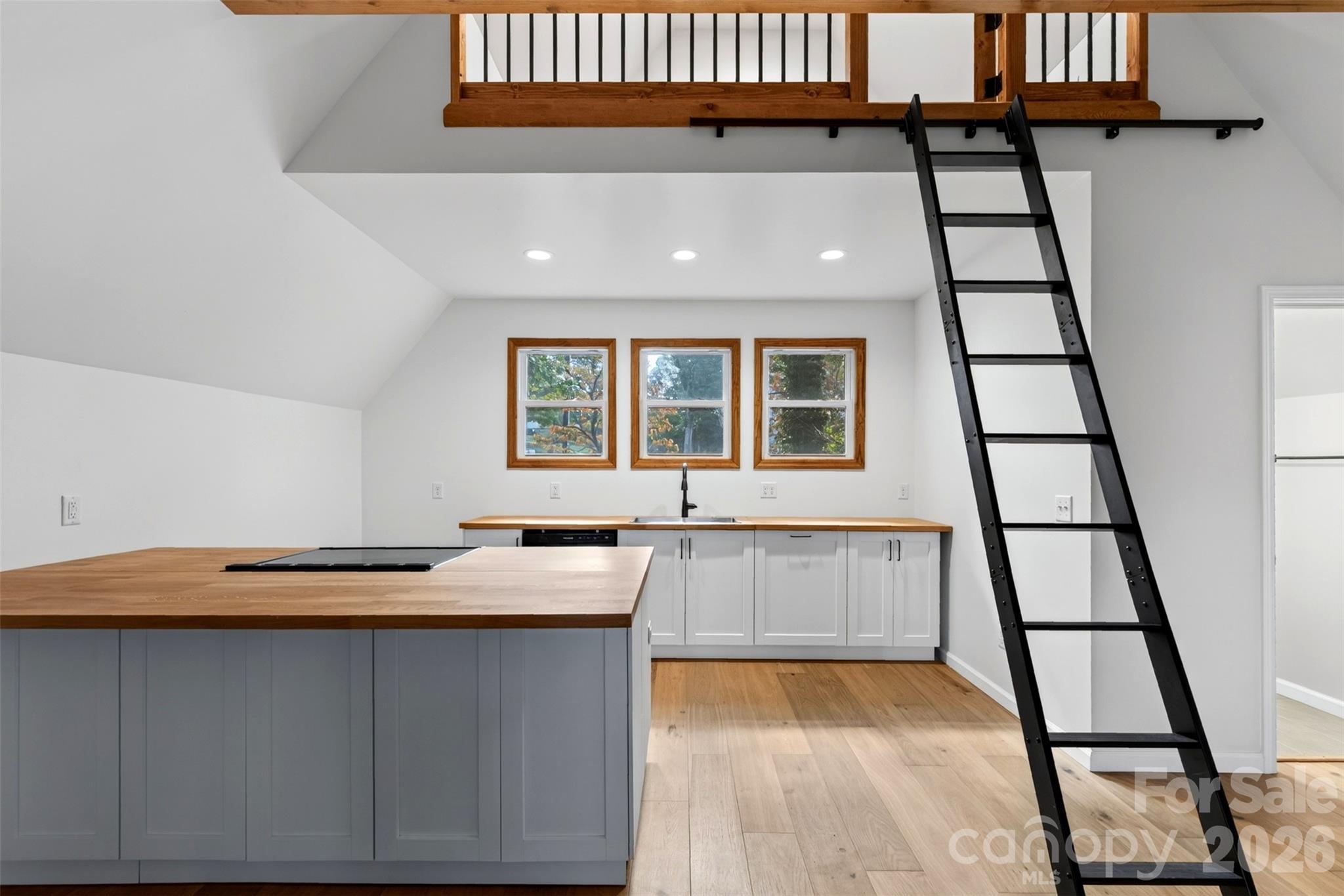 Soaring ceilings with a loft nook for additional space. - 56 Pine Cone Drive, Asheville