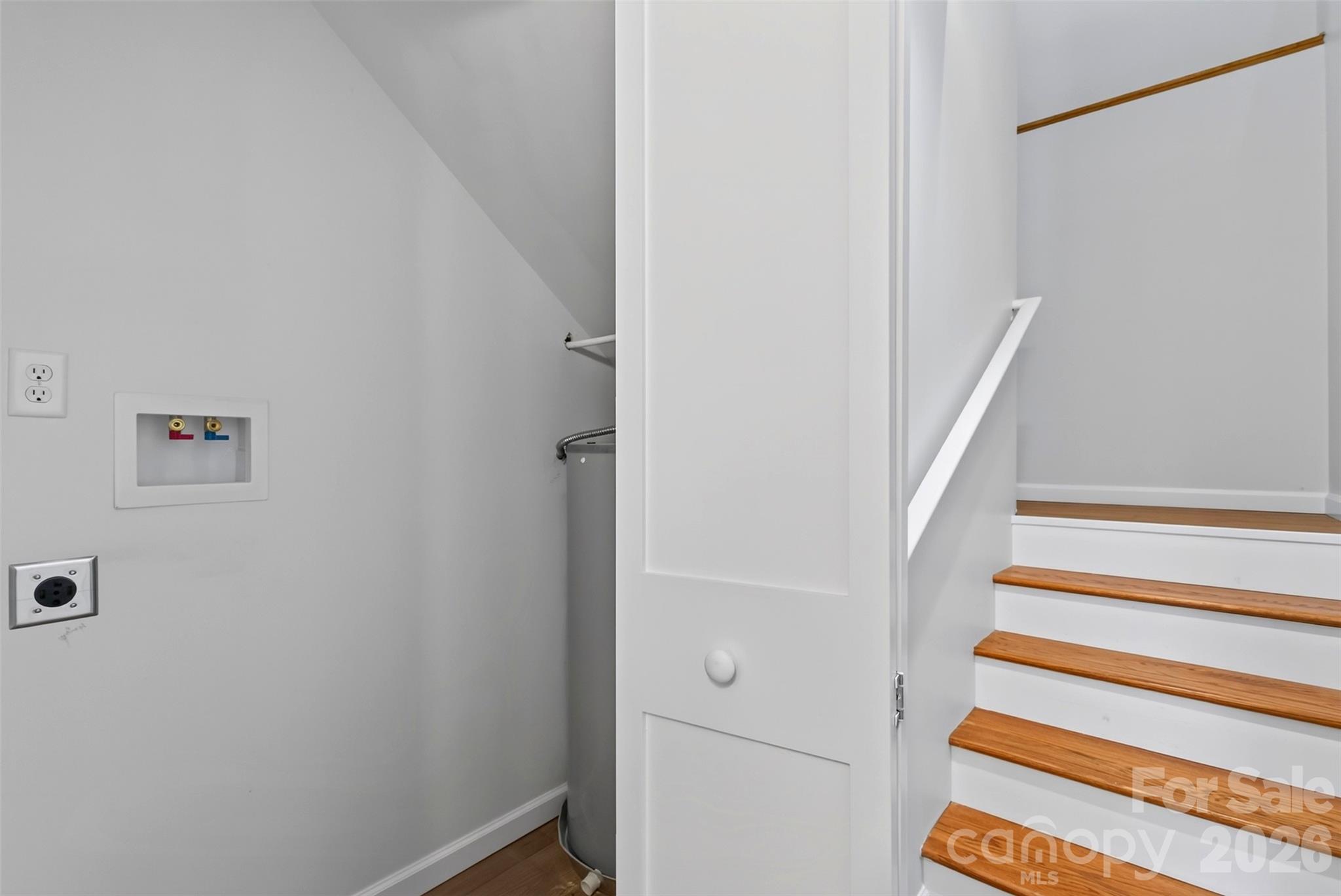 Downstairs has a laundry closet near the bedroom and renovated bath - 56 Pine Cone Drive, Asheville
