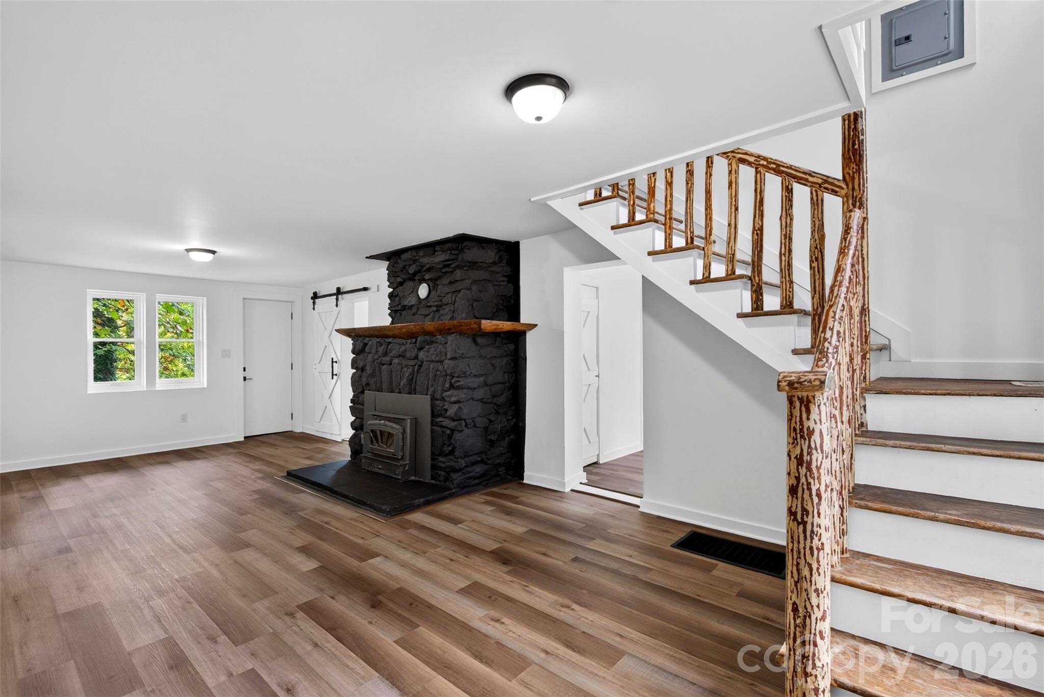 Let's start with 64 Pine Cone. Historic details were retained during the renovation. - 64 and 56 Pine Cone Drive, Asheville