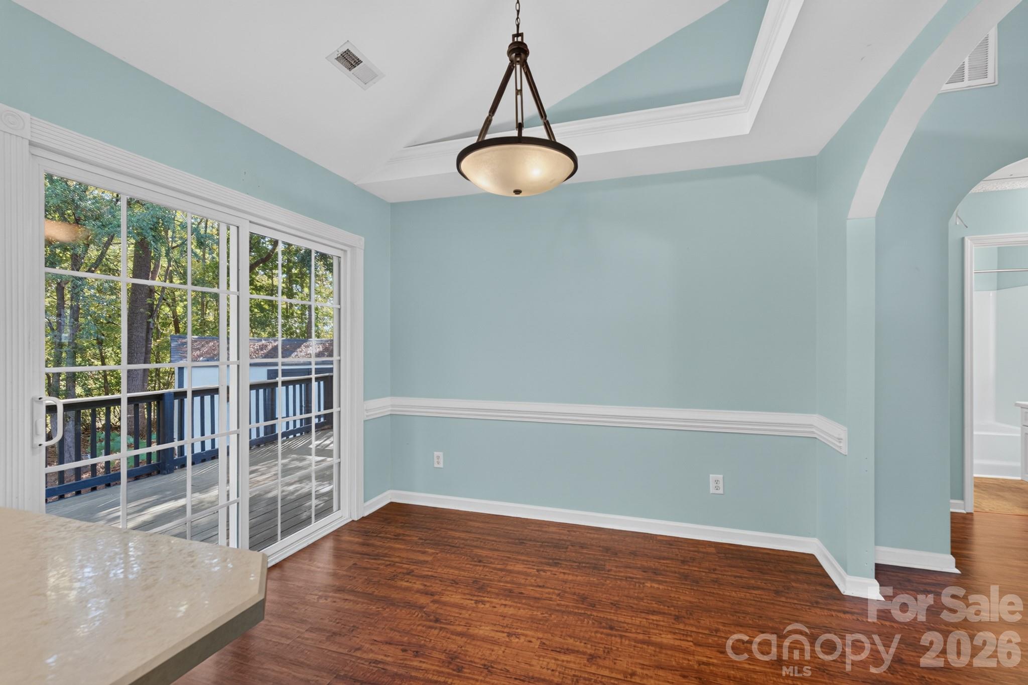 Perfectly situated adjacent to the kitchen, making everyday meals and hosting guests a breeze. - 702 Painted Lady Court, Rock Hill