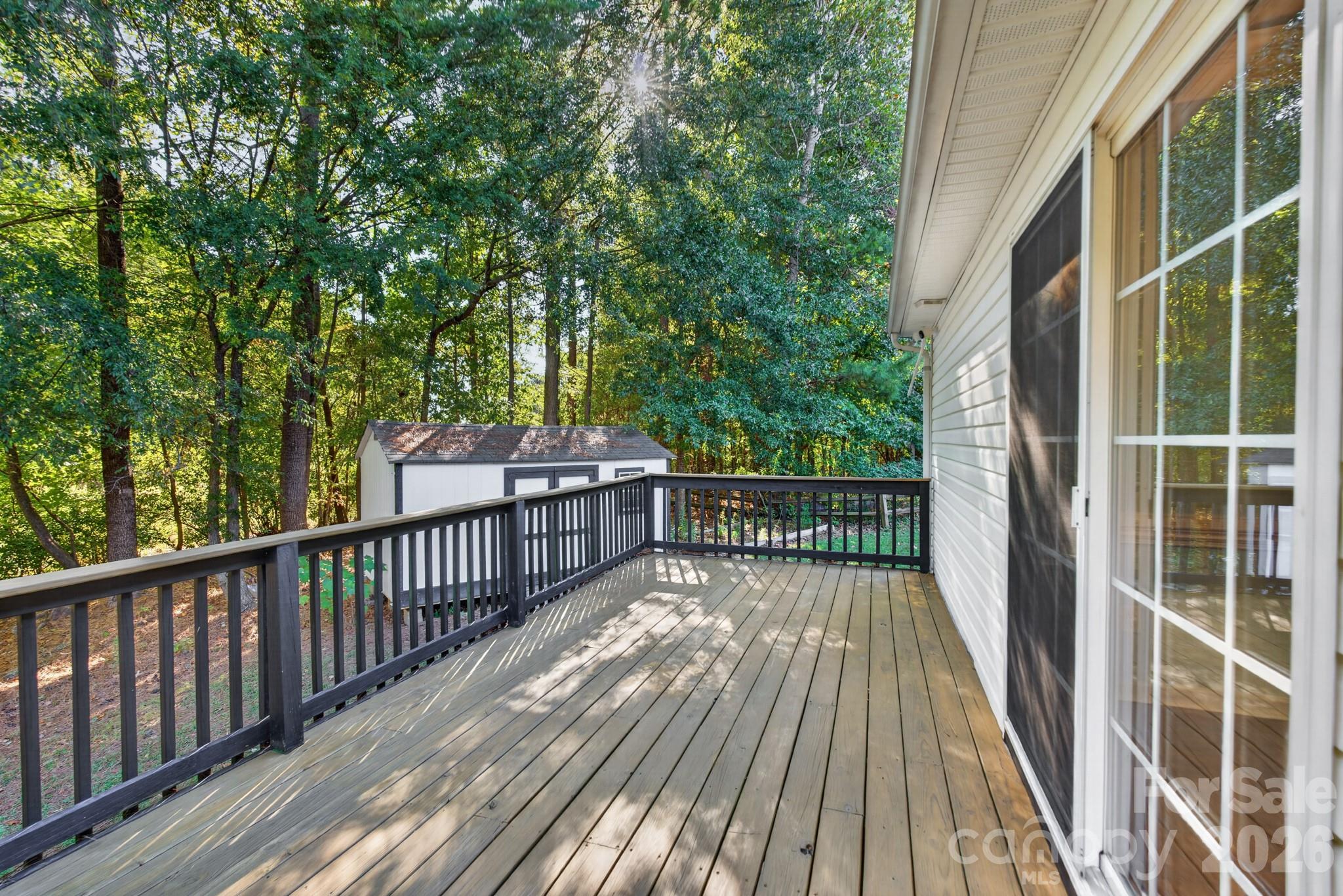 Expansive wooden deck offers plenty of room for patio furniture, dining sets, and outdoor loungers. - 702 Painted Lady Court, Rock Hill