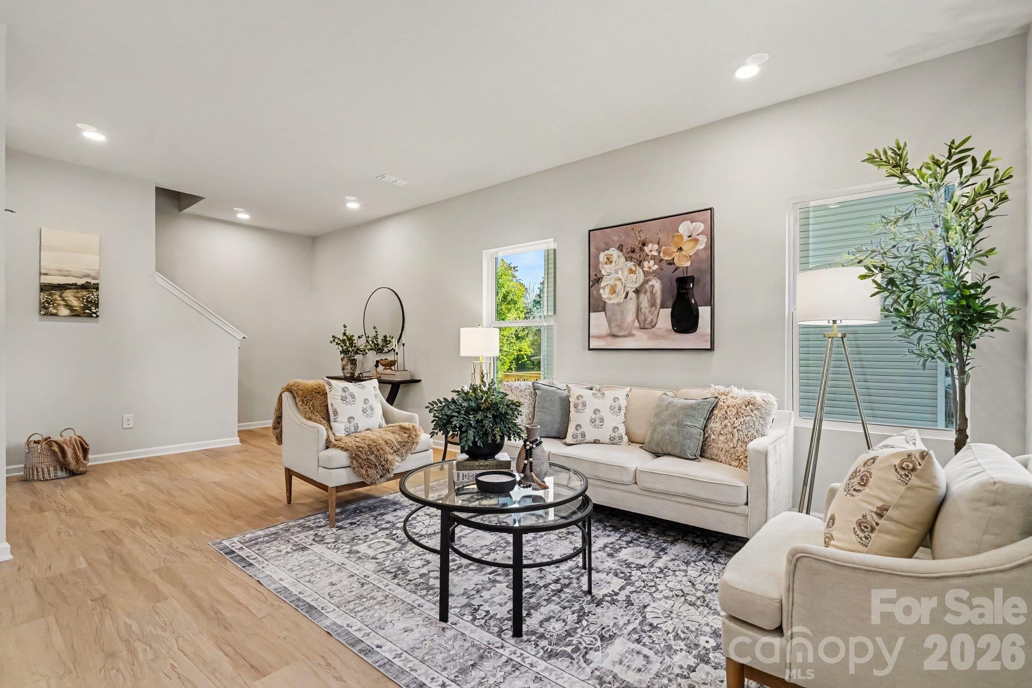 From front door entrance, this depicts the view of the great room. This is a representative photo taken from an identical home next door. - 125 Buffalo Avenue NW, Concord