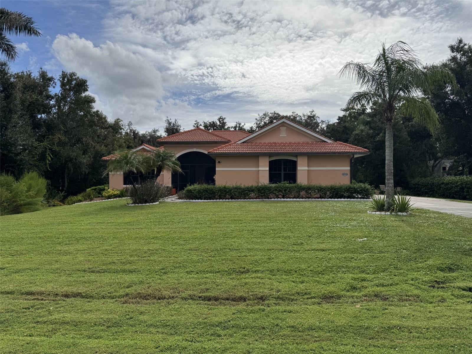 STREET VIEW WITH LARGE FRONT YARD - 1303 OAKFORD RD, SARASOTA