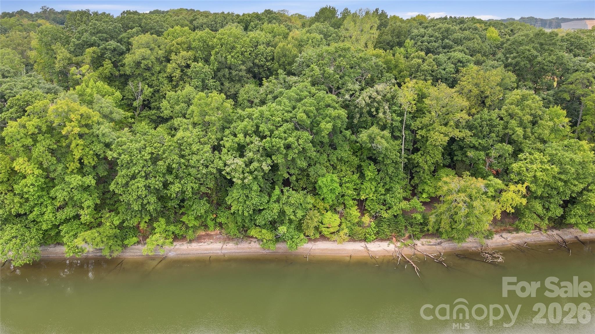 Approximately 103 feet of natural shoreline and expansive main-channel views that stretch for miles - 1029 Nutall Oak Lane, Belmont