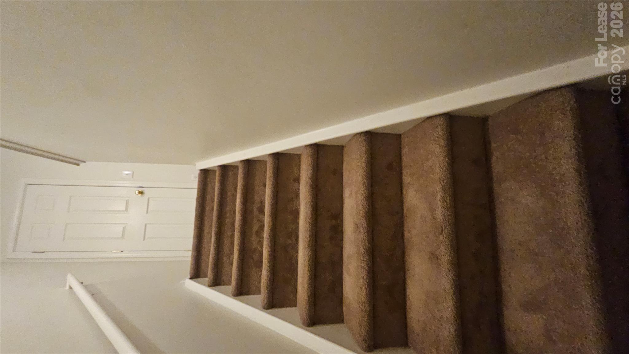 Stairs leading second floor - 8013 Stoneham Street, Matthews