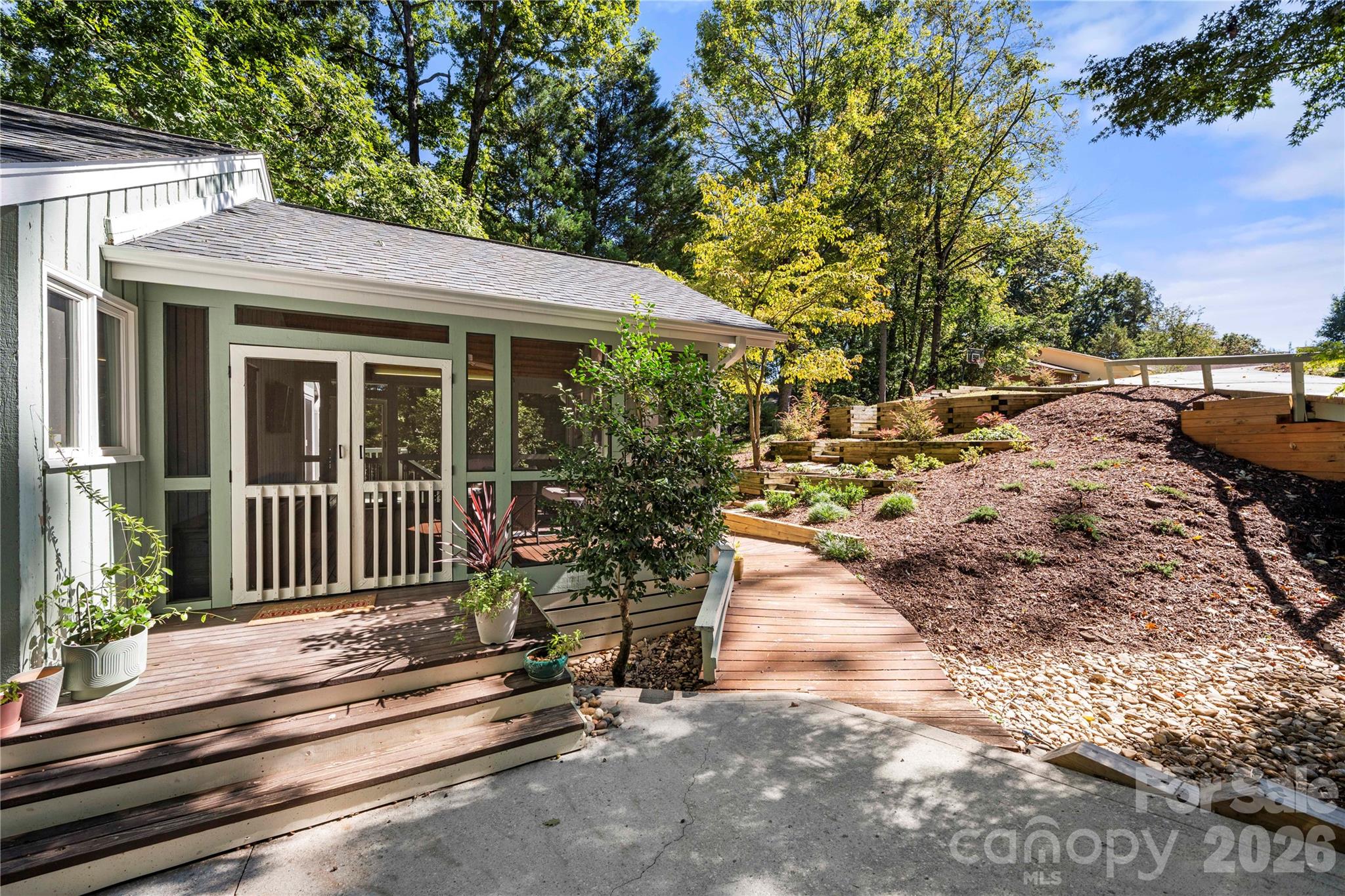 Newly done landscaping and retaining walls, new wood on the bridge as well. - 6 Oakwood Court, Clover