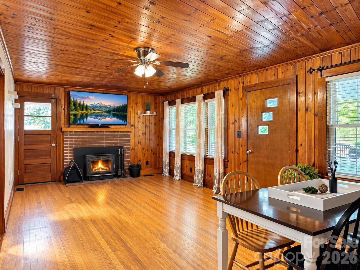 Cozy living room/dining area*enhanced with fire & tv screen saver - 683 McDaniel Road, Lake Lure