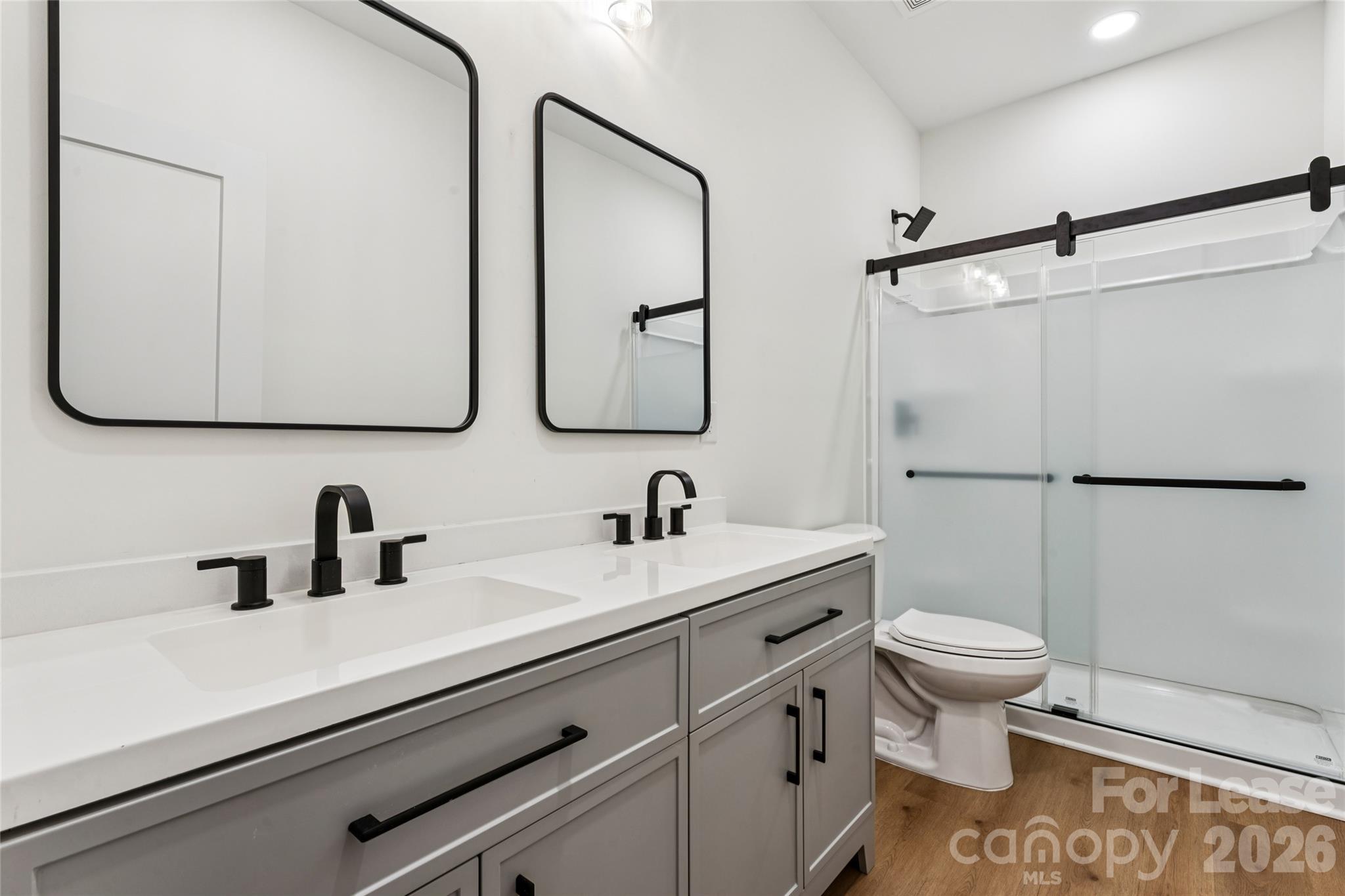Full bath with double vanities and walk in shower - 11924 Crabapple Lane, Huntersville