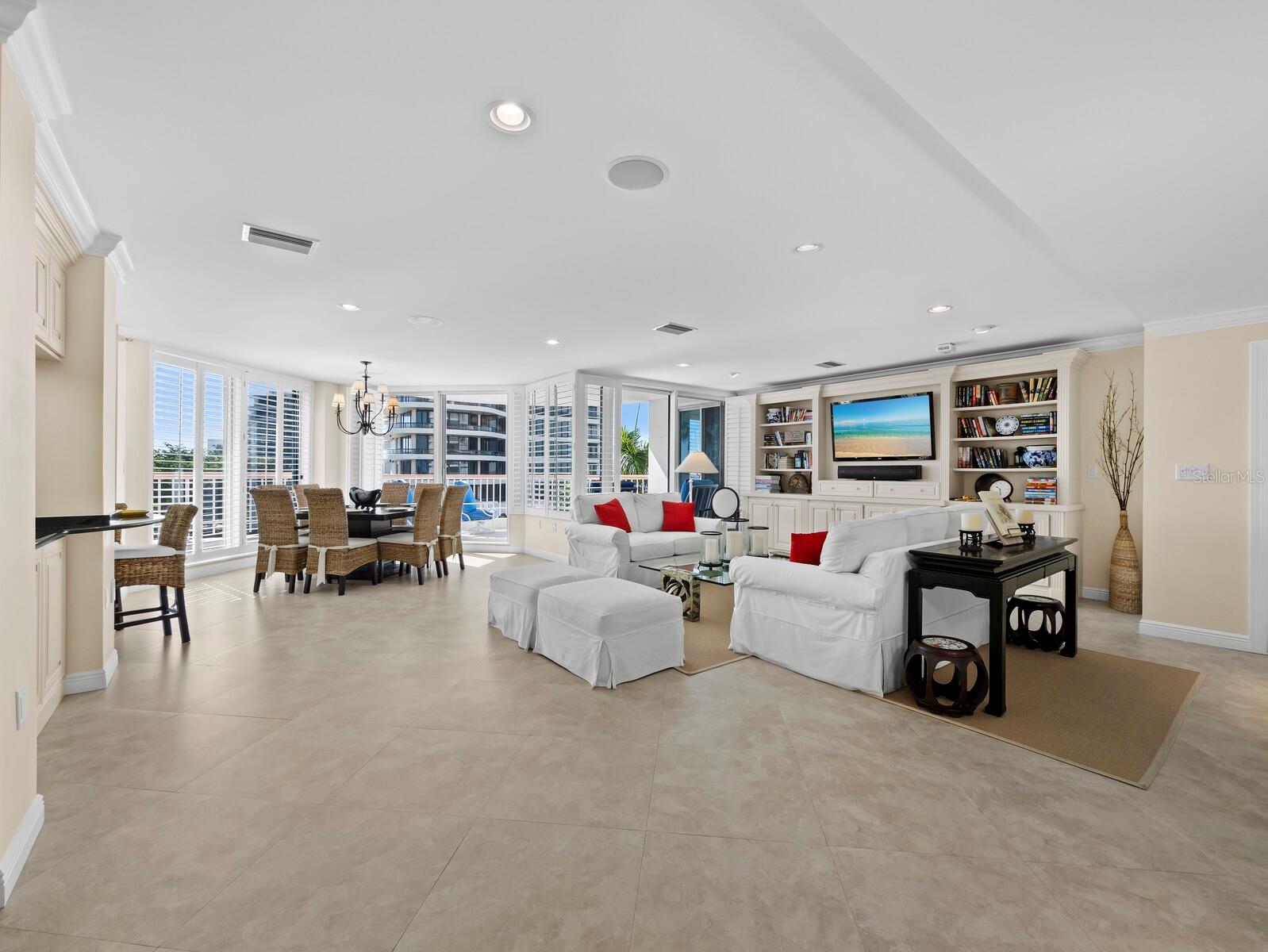 High ceilings, open floor plan, floor-to-ceiling windows optimize the light and views. Enjoy sunset Gulf views to the west and sparkling city views to the east at night. - 455 LONGBOAT CLUB RD #402, LONGBOAT KEY